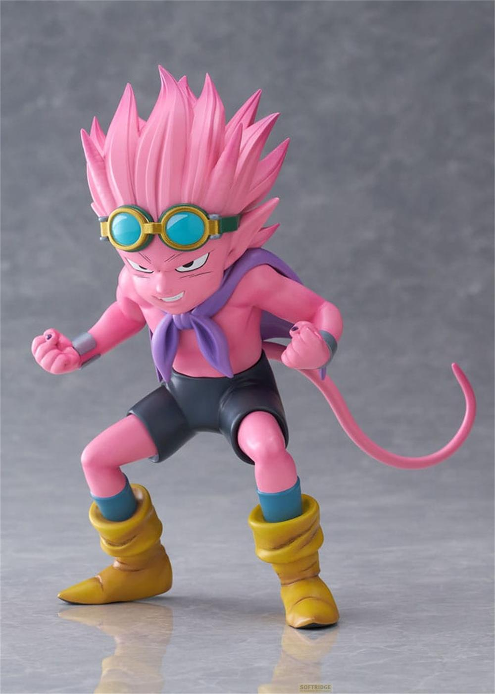 Una figura rosa con pelo puntiagudo, gafas, bufanda morada y botas amarillas.