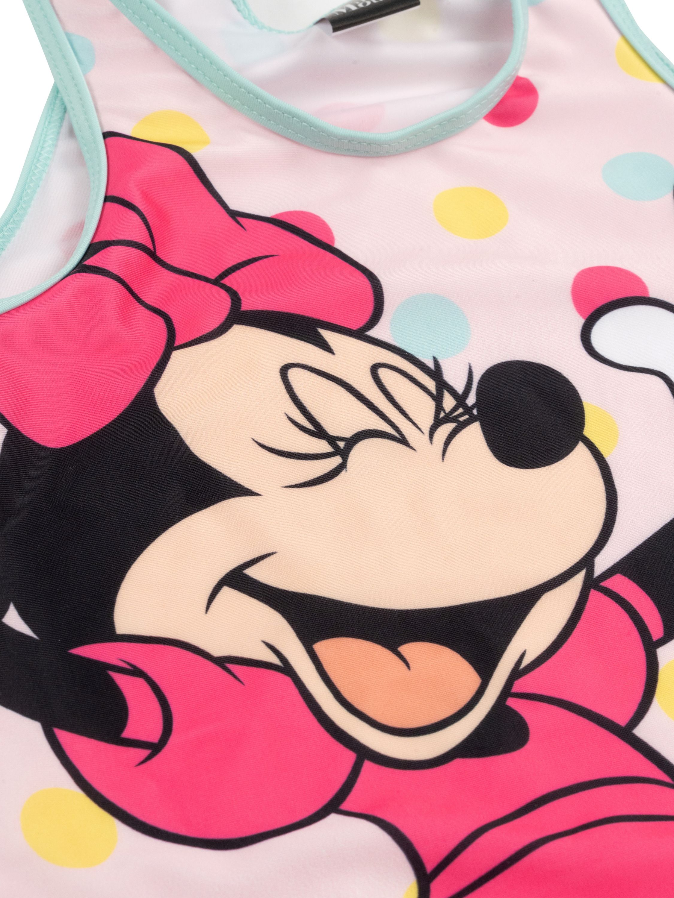 Ein rosa Badeanzug mit Micky Maus und bunten Punkten.