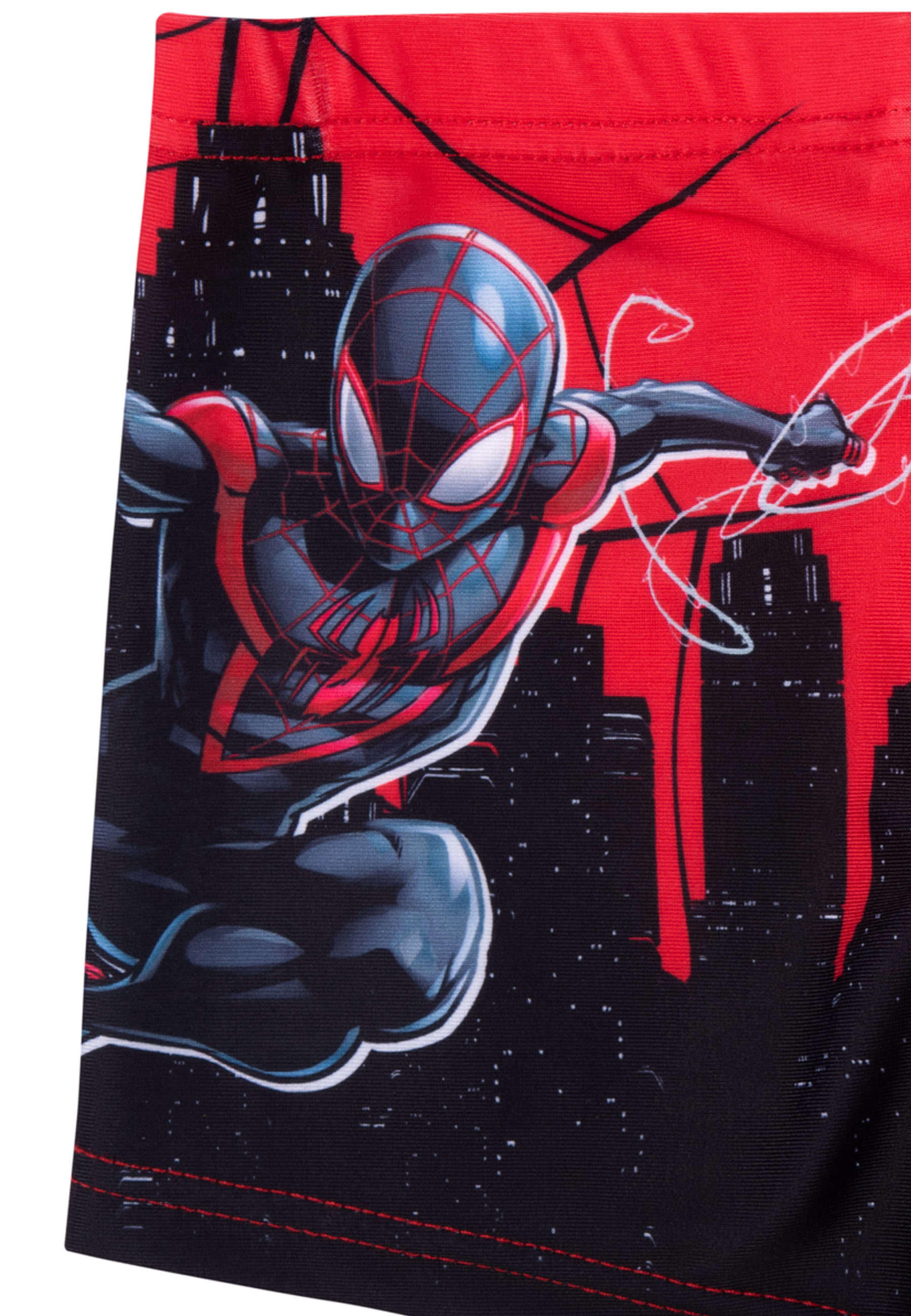 Spiderman in Schwarz und Rot vor einer Stadtkulisse mit roten Akzenten.