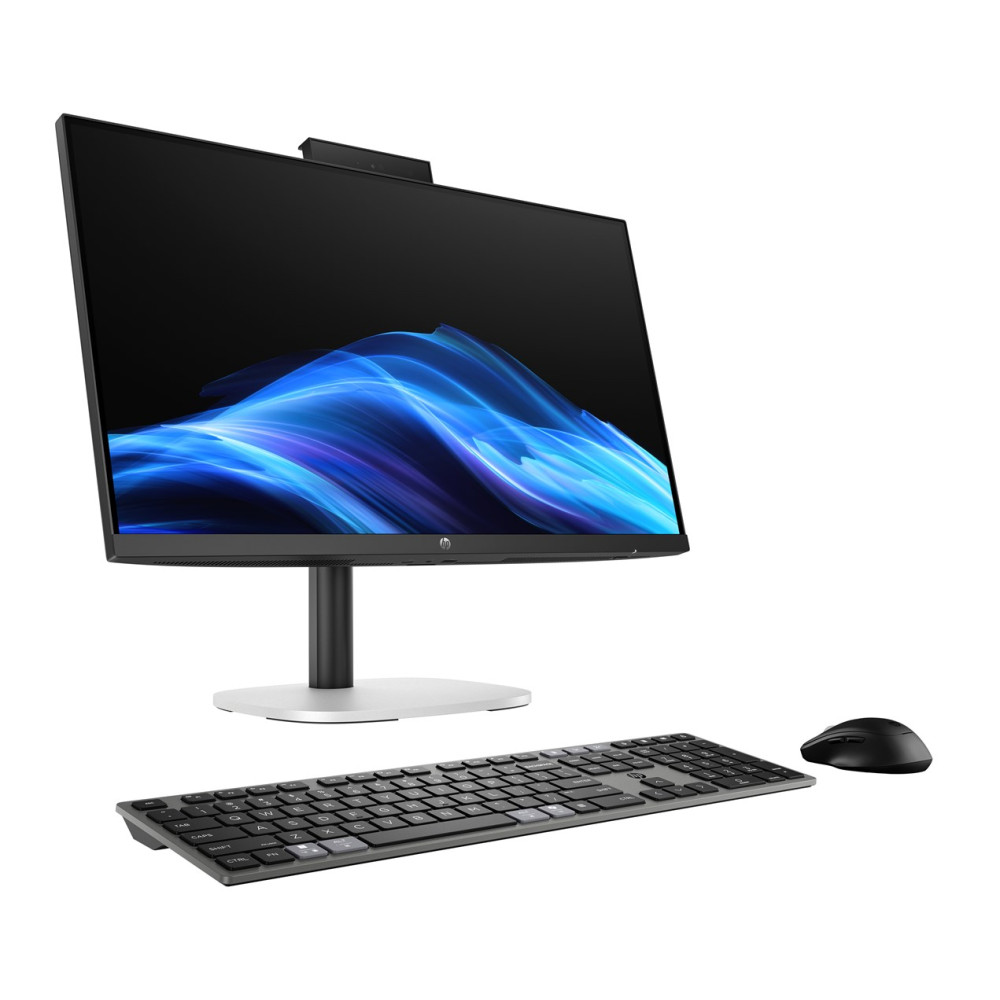 Komputer All-in-One z czarnym monitorem, klawiaturą i myszką na białym tle.