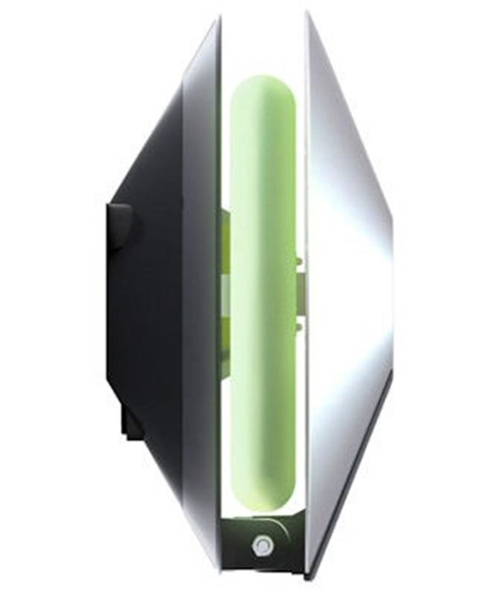 Een lichtgroene cilinder tussen zwarte en zilveren oppervlakken.