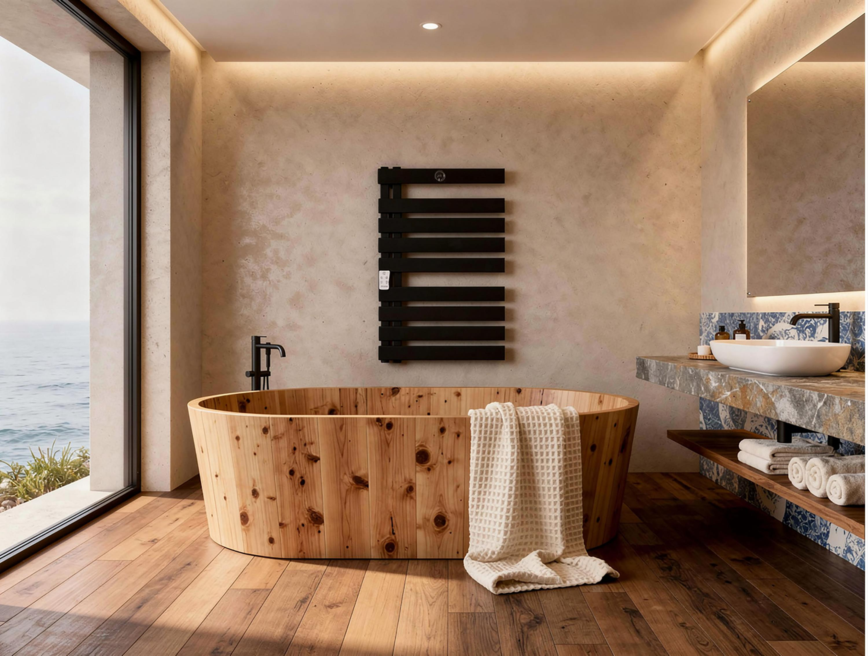Una bañera de madera se asienta sobre un suelo de madera junto a una ventana con vistas al mar.