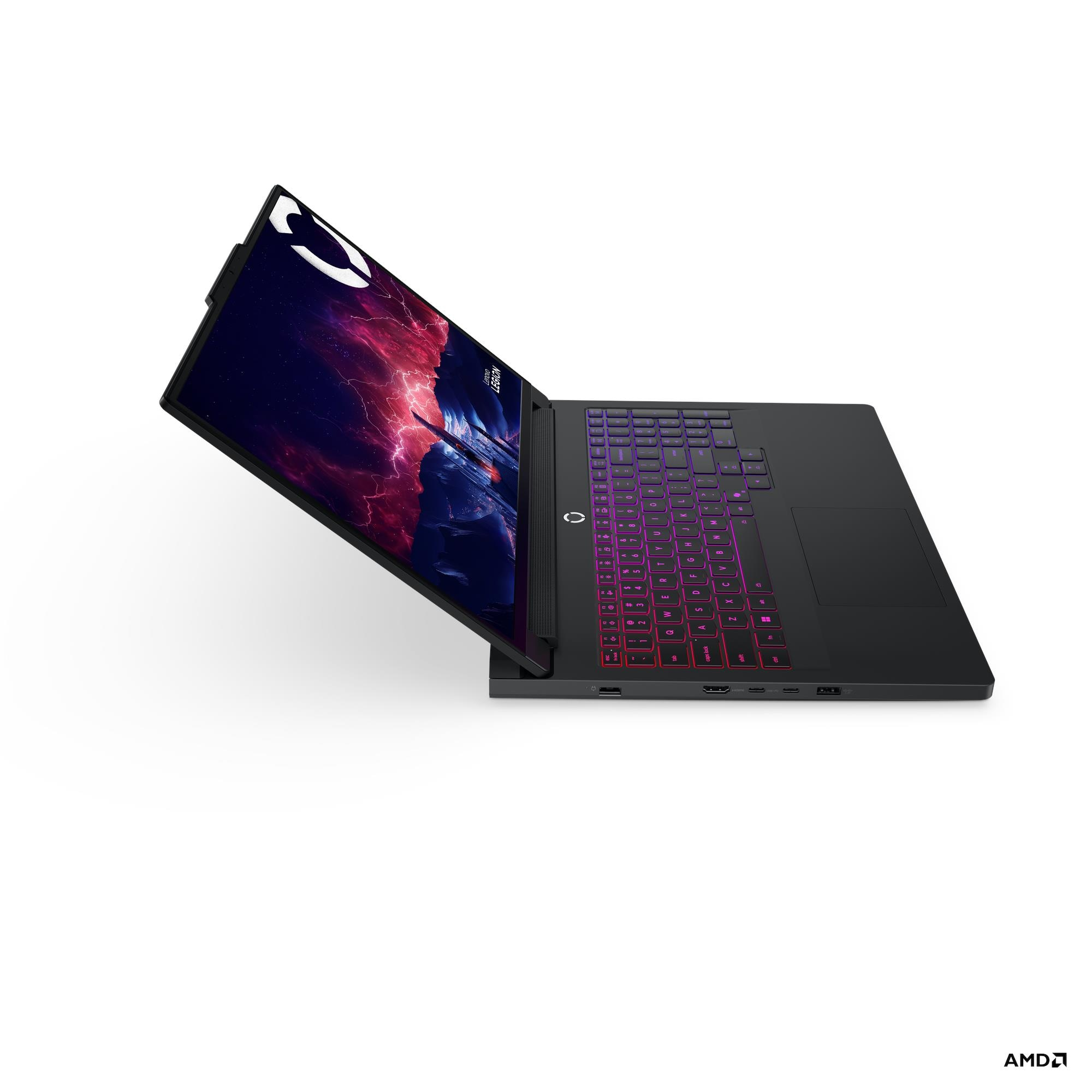Laptop da gaming nero con tastiera illuminata e sfondo cosmico.