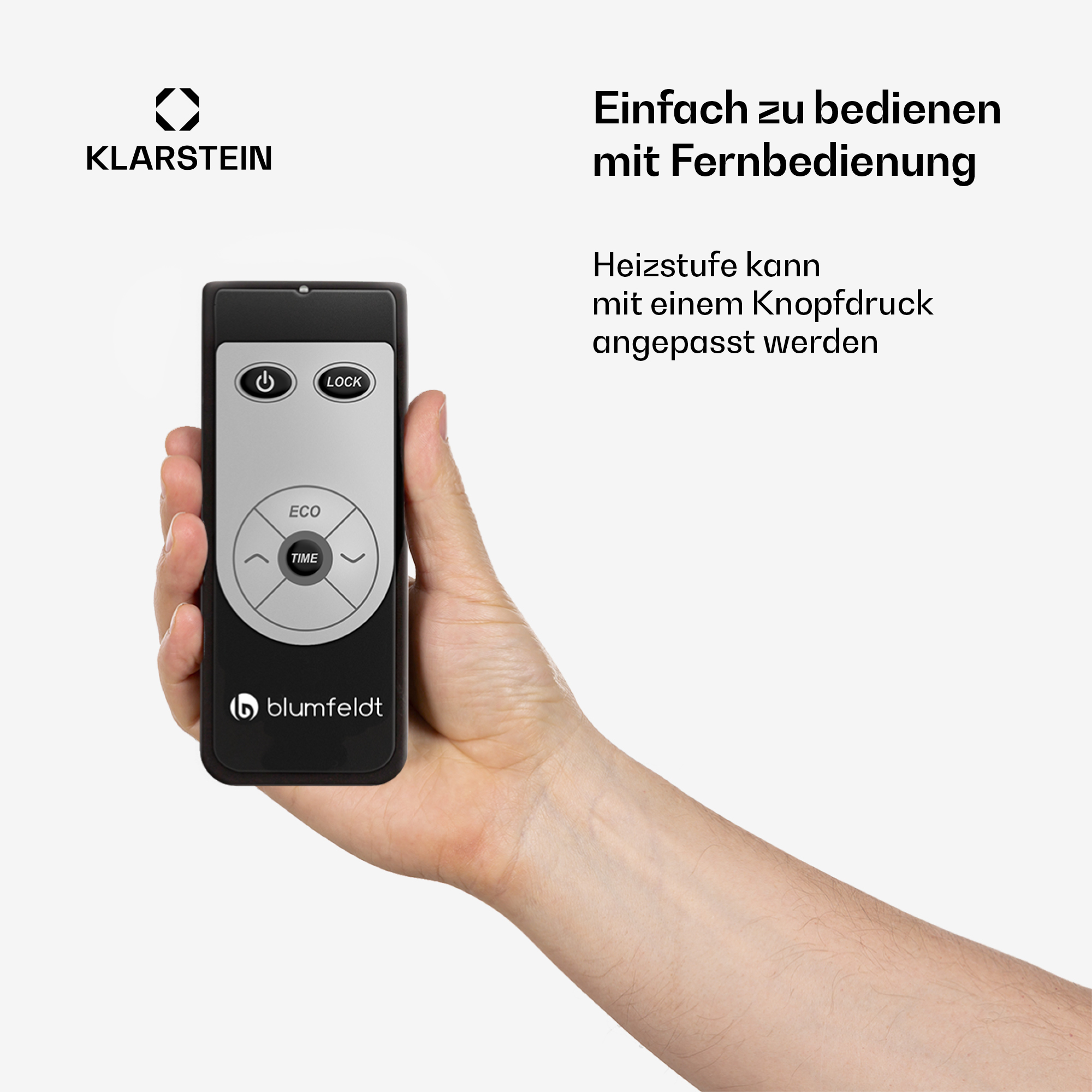 Eine Hand hält eine Klarstein Fernbedienung mit Power-, Lock-, Eco-, Zeit-Tasten.