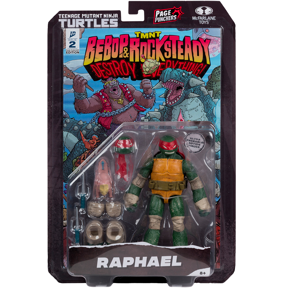 Action figure di Raphael in confezione con sfondo fumetto e accessori.