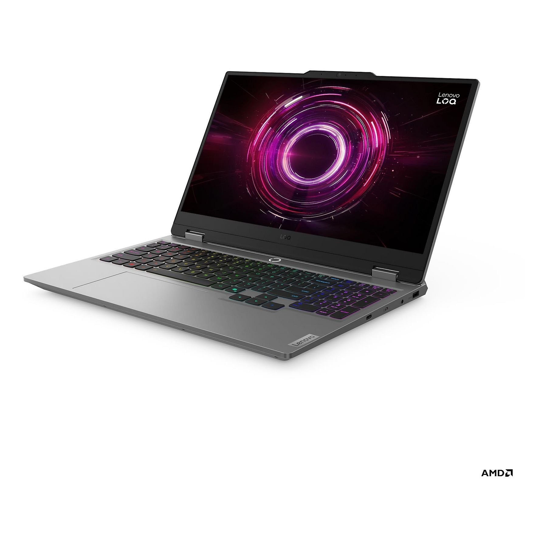 Un laptop Lenovo grigio con tastiera retroilluminata e sfondo vivace.