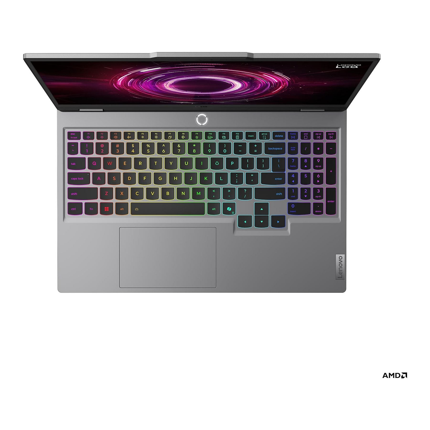 Un laptop grigio aperto con tastiera retroilluminata e sfondo colorato dello schermo.