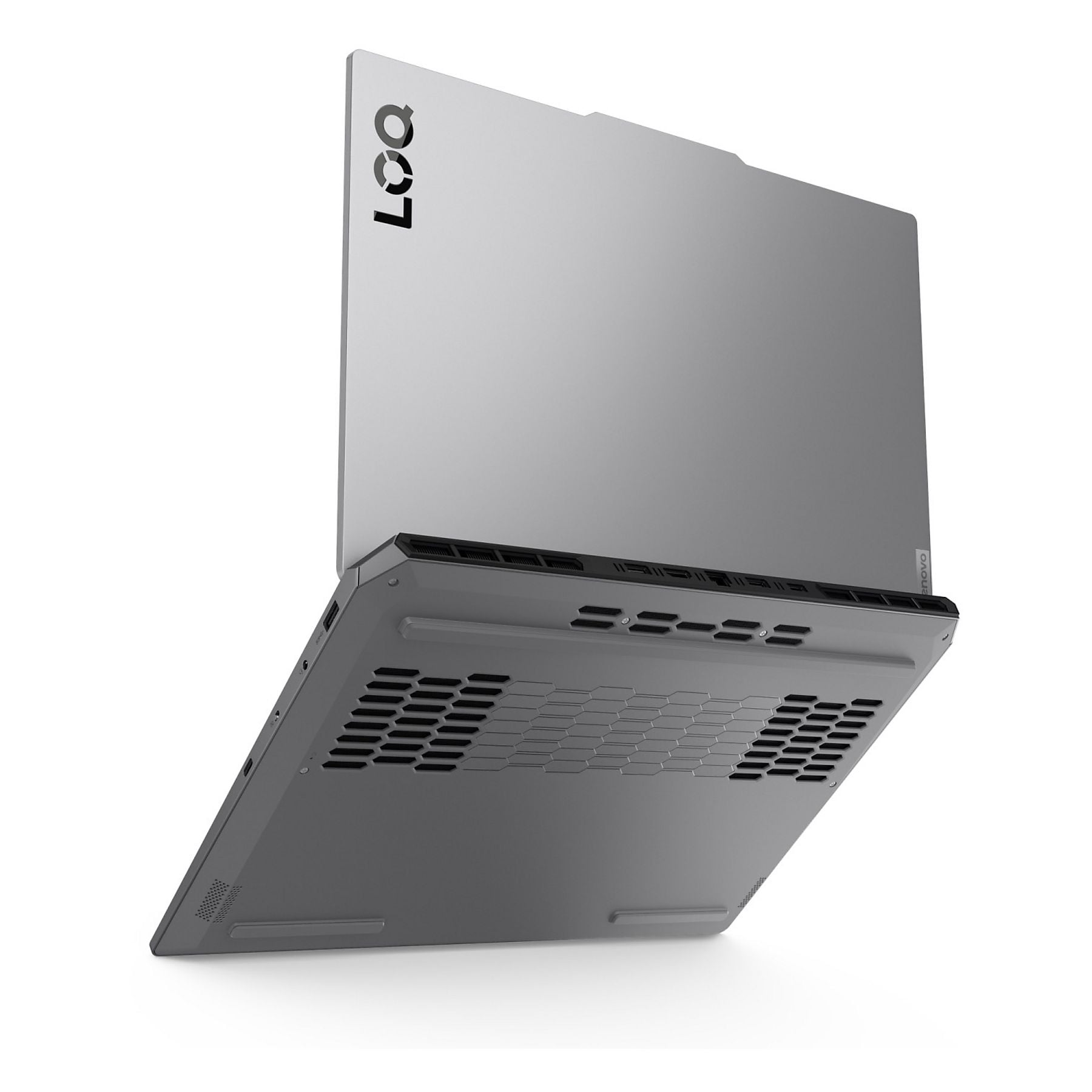Un laptop argentato con coperchio aperto, mostra il fondo con prese d'aria e logo.