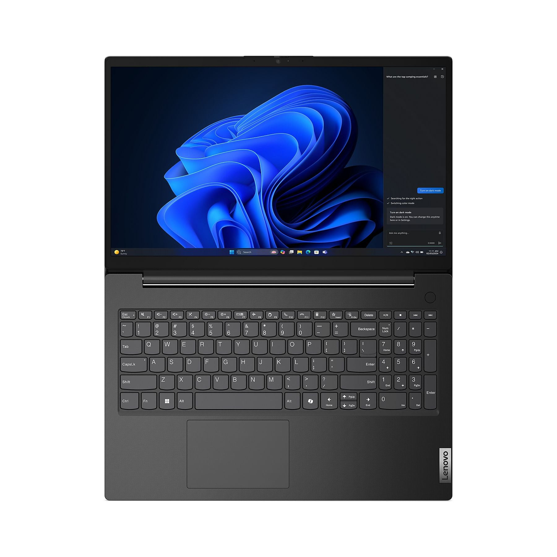 Un laptop aperto che mostra Windows 11 con uno sfondo blu.