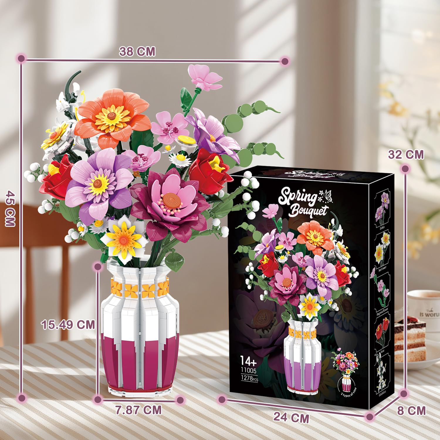 Ein bunter Blumenstrauß aus Bausteinen in einer weißen und lila Vase neben der Verpackung.