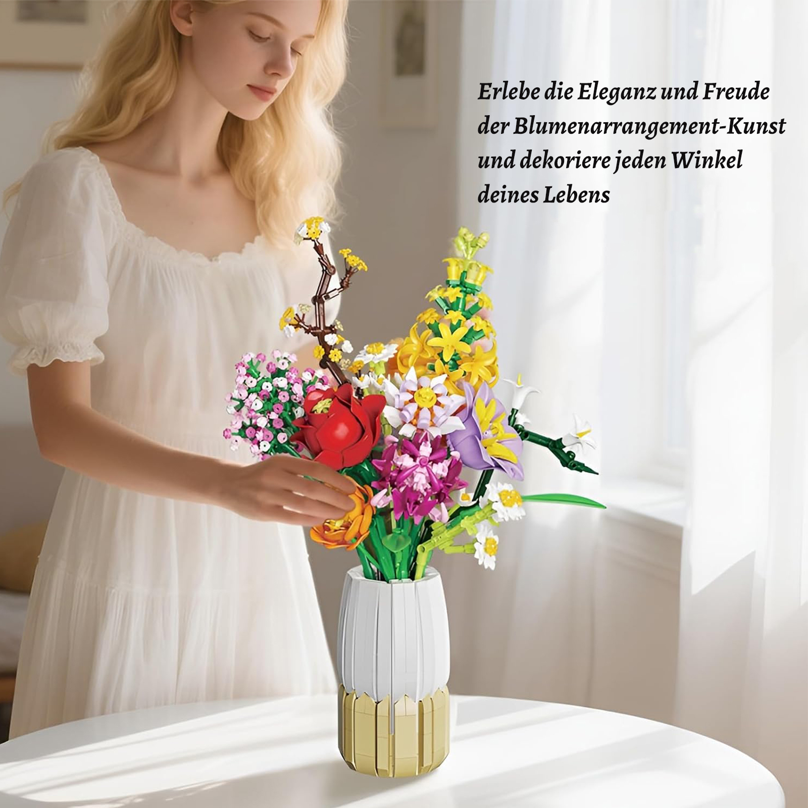 Eine Frau in einem weißen Kleid arrangiert einen bunten Blumenstrauß aus Bausteinen.