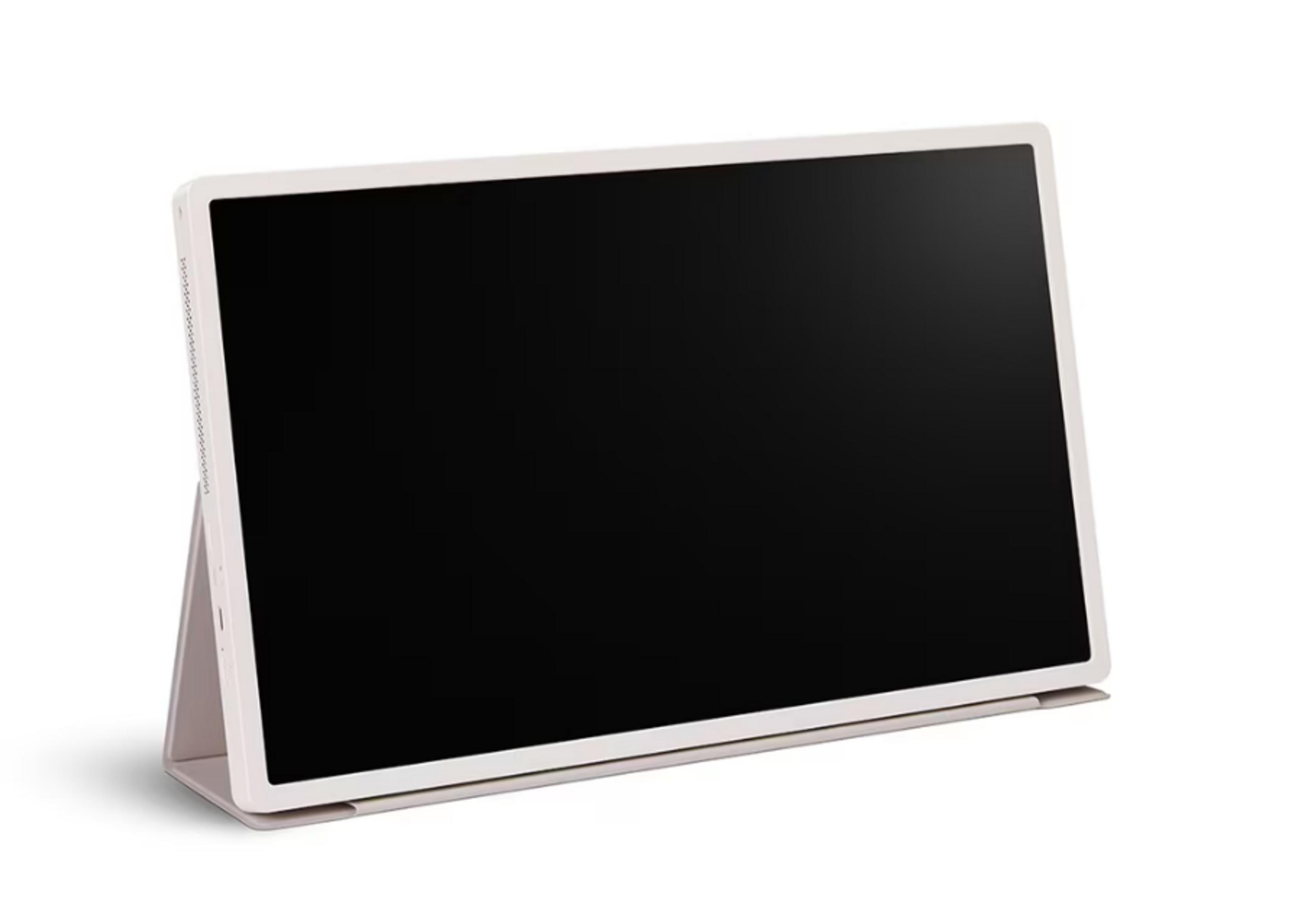 Siyah ekranlı beyaz bir tablet bir stant üzerinde duruyor.