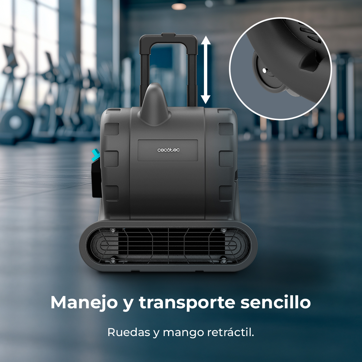 Dispositivo portatile nero con manico estensibile e ruote in una palestra.