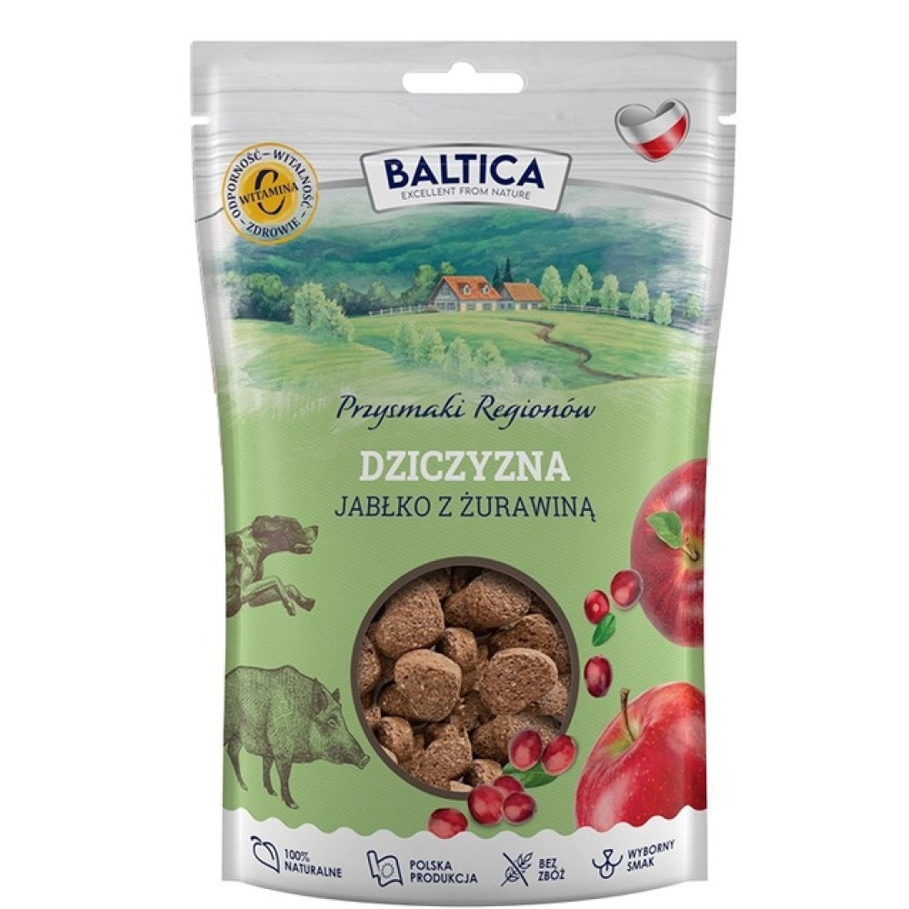 Opakowanie karmy dla psów z dziczyzną, jabłkiem i żurawiną. W tle krajobraz.