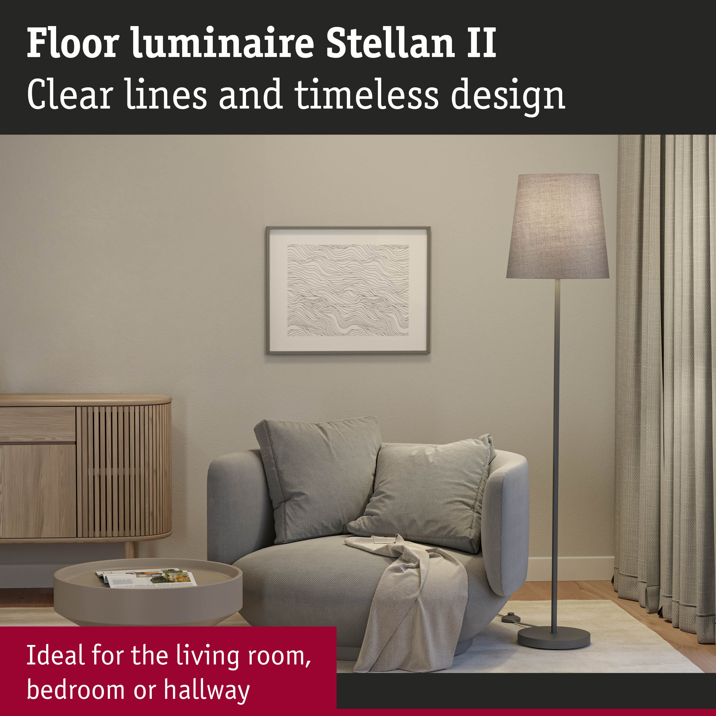 Szary fotel z poduszkami i kocem obok okrągłego stolika kawowego.