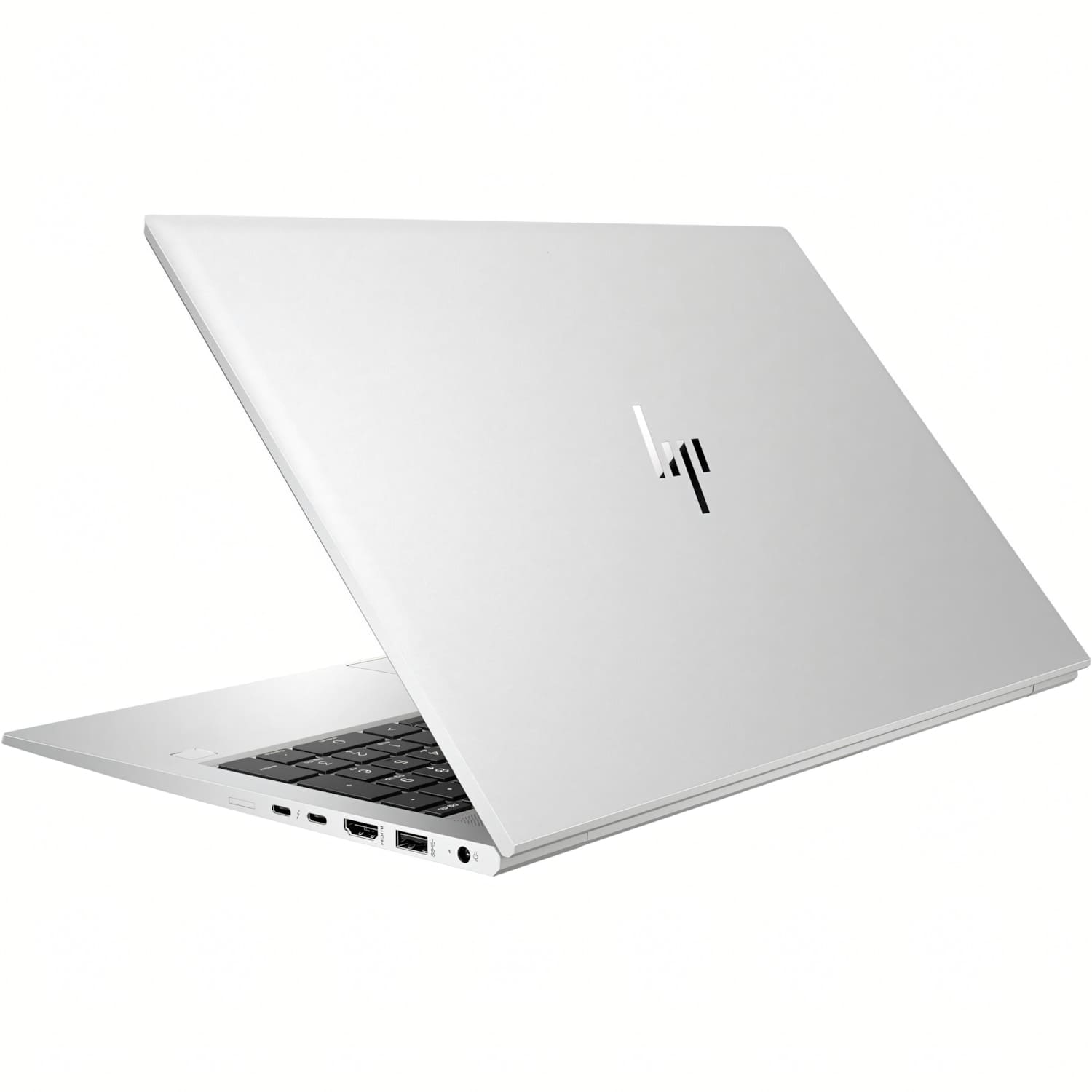 Un portátil plateado con la tapa abierta, mostrando el teclado iluminado sobre fondo blanco.