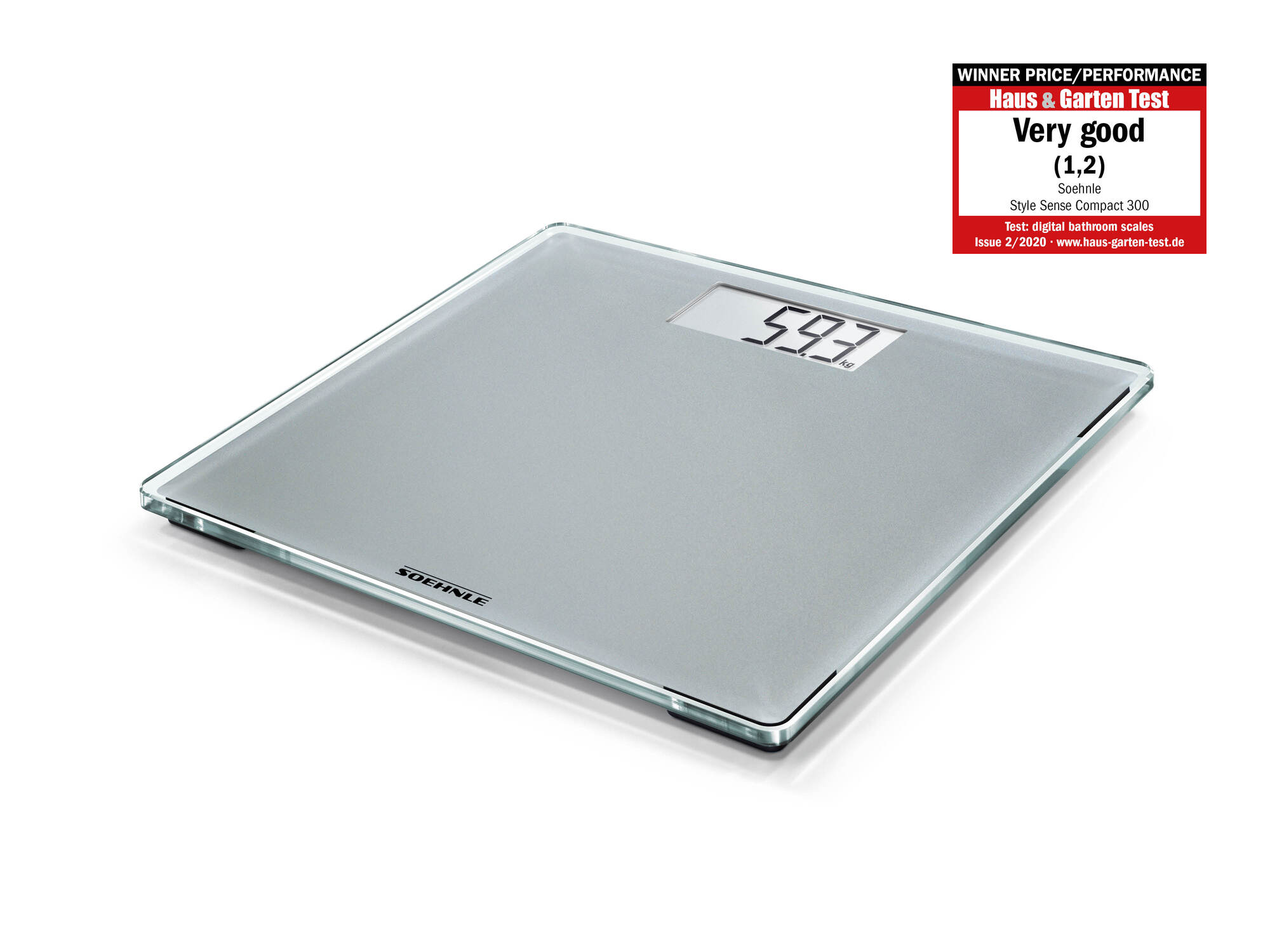 Cyfrowa waga łazienkowa Soehnle ze szklanym blatem pokazuje 59,3 kg. Naklejka z recenzją po prawej.