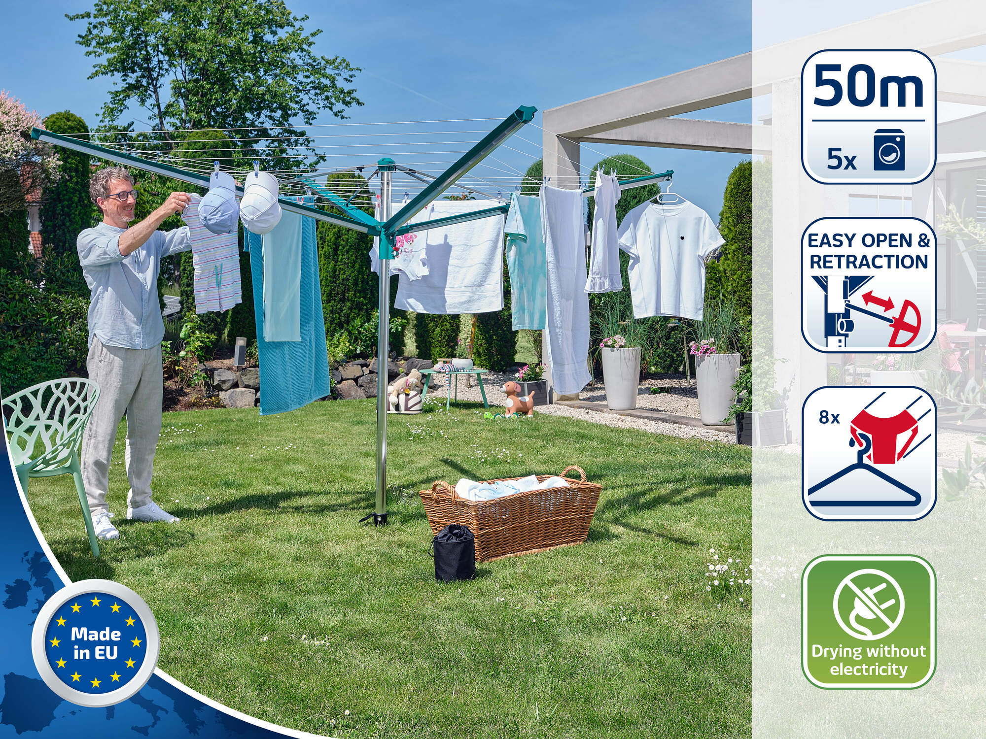 Mann hängt Wäsche auf einem Wäscheständer im Garten auf. 50m Leinenlänge.