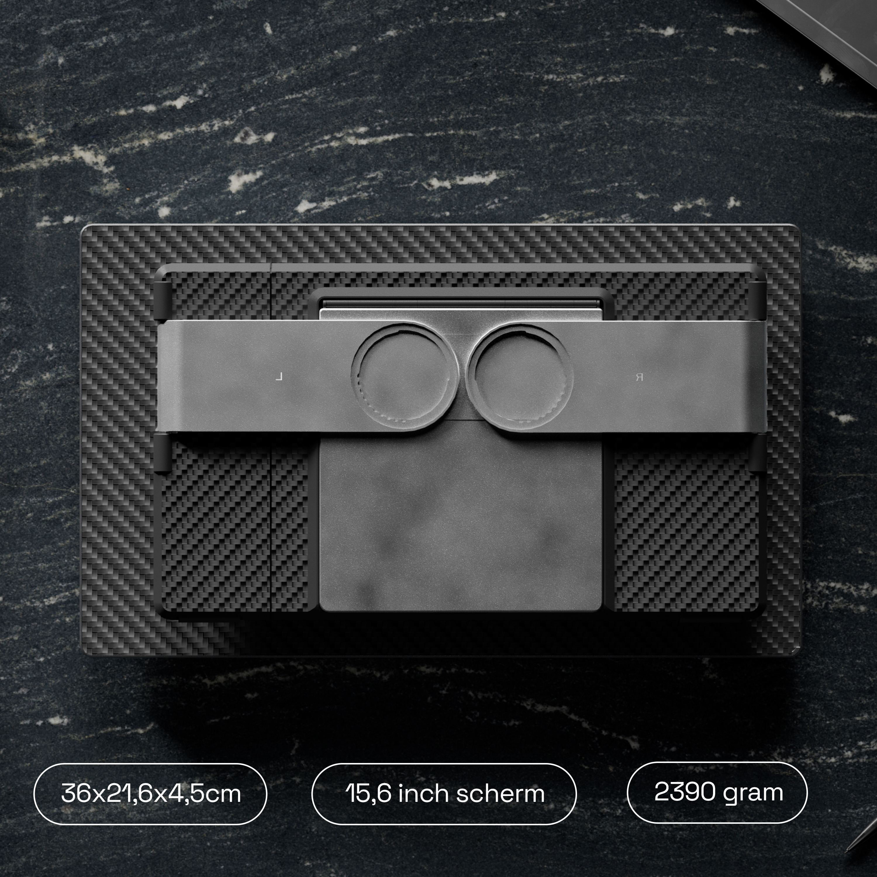 Grey device with carbon pattern, 36x21.6x4.5cm, 15.6" screen, 2390g.