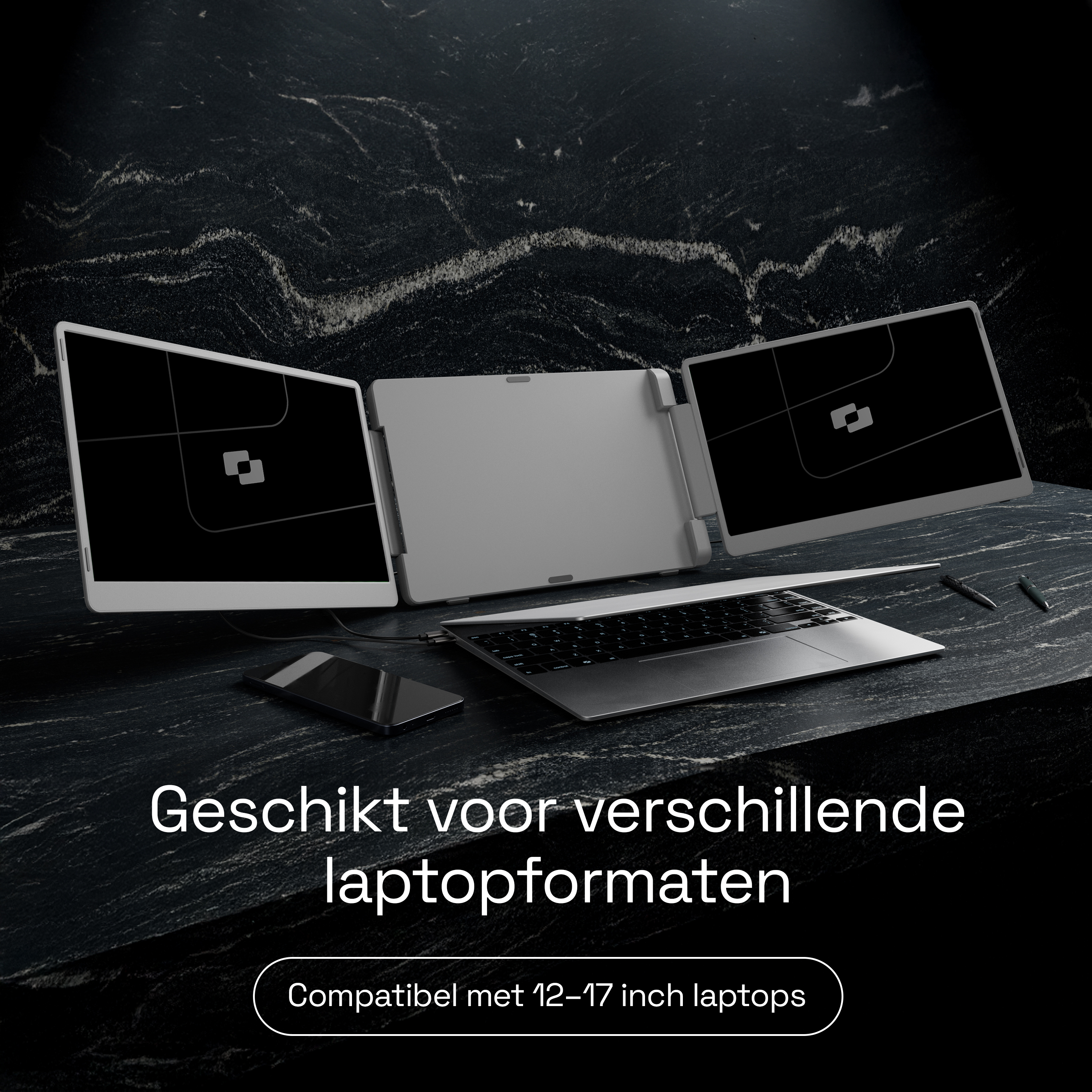 A laptop with two external monitors on black marble.