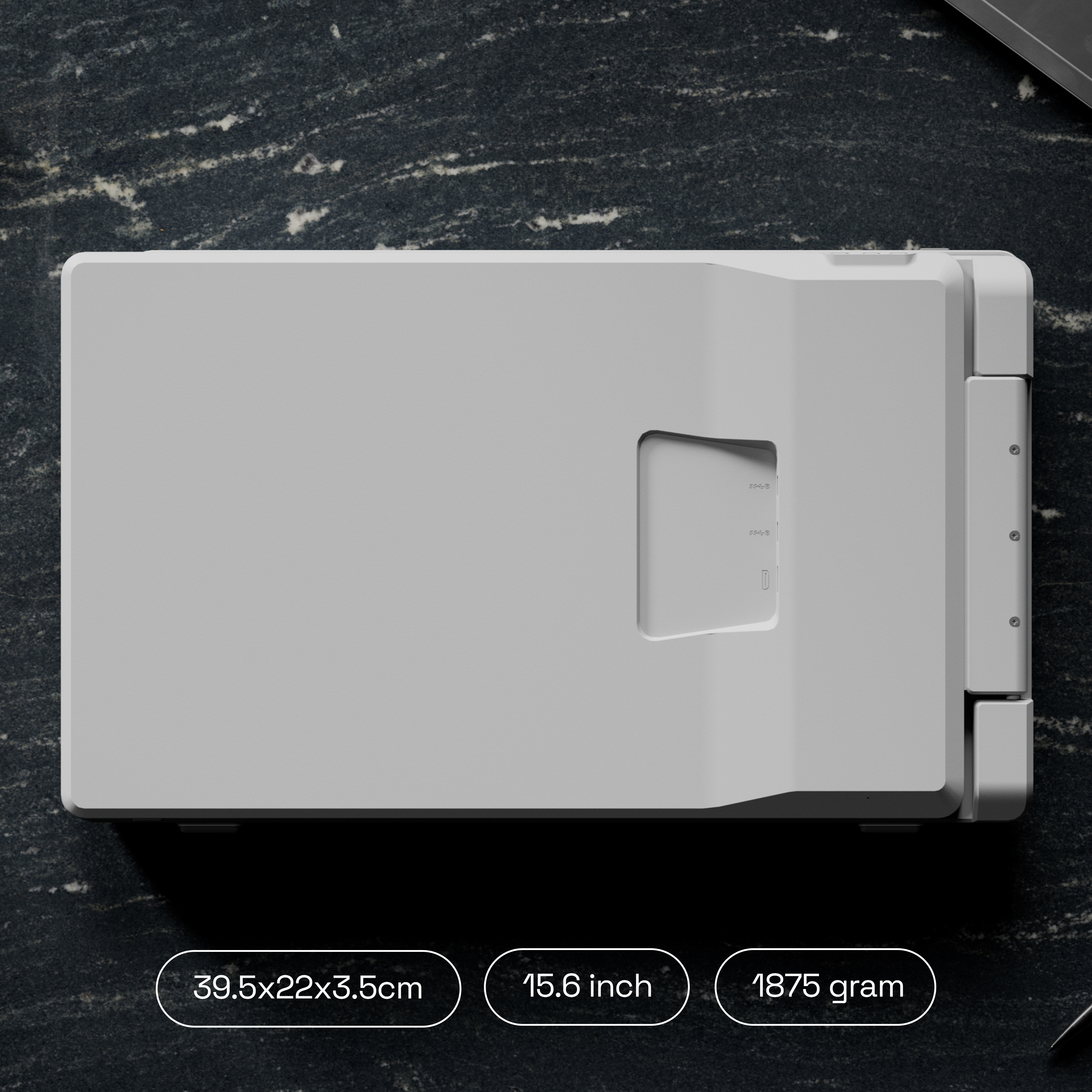 Boîtier de portable gris clair sur marbre sombre avec dimensions.