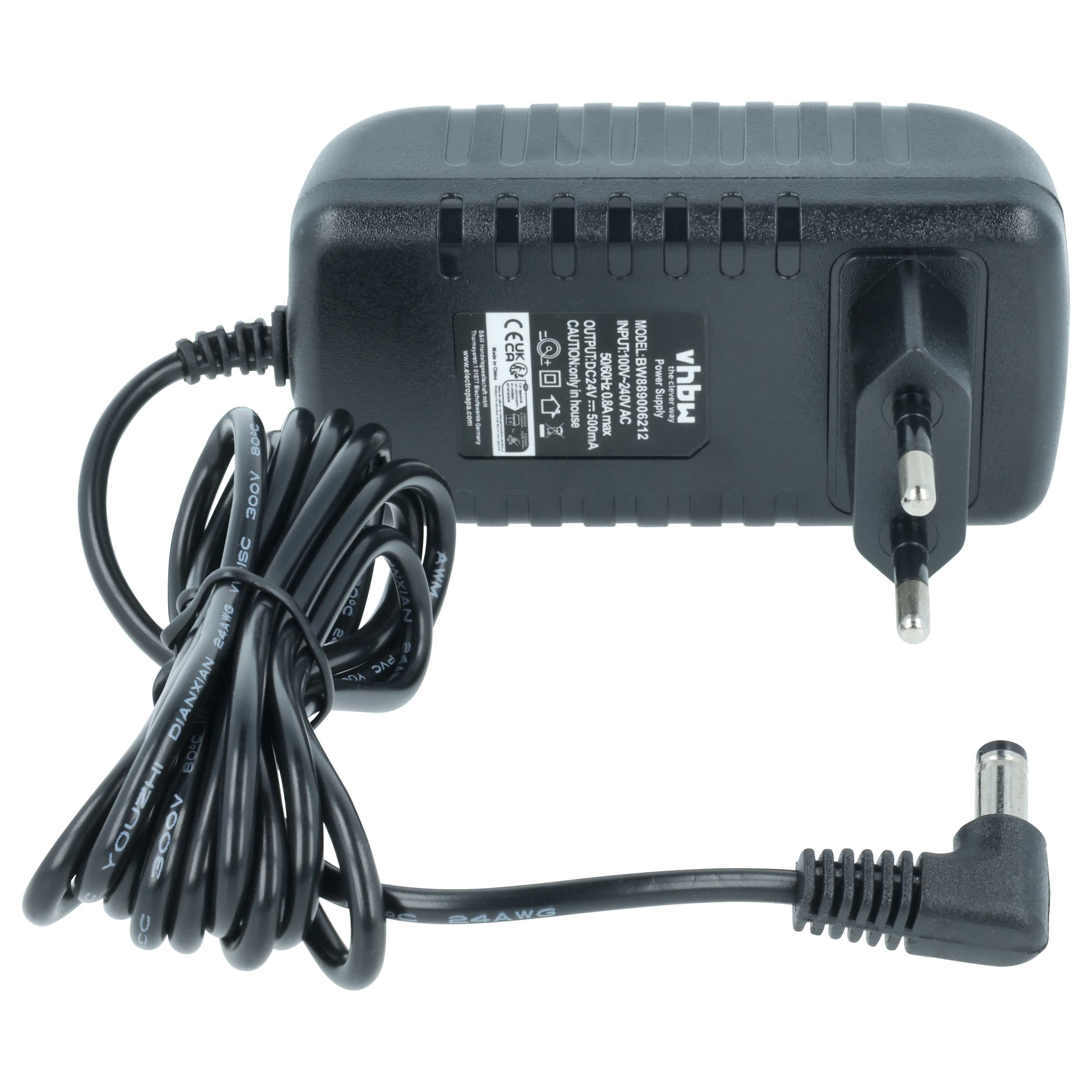 Schwarzes Netzteil mit Kabel und Eurostecker, Beschriftung lesbar.
