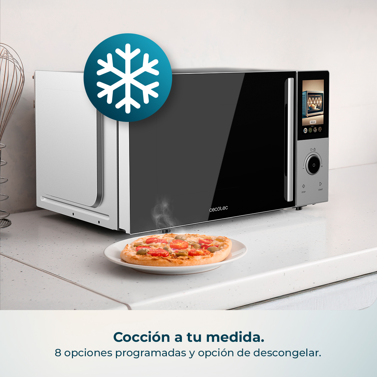 Un microonde con un'icona di fiocco di neve e una pizza.