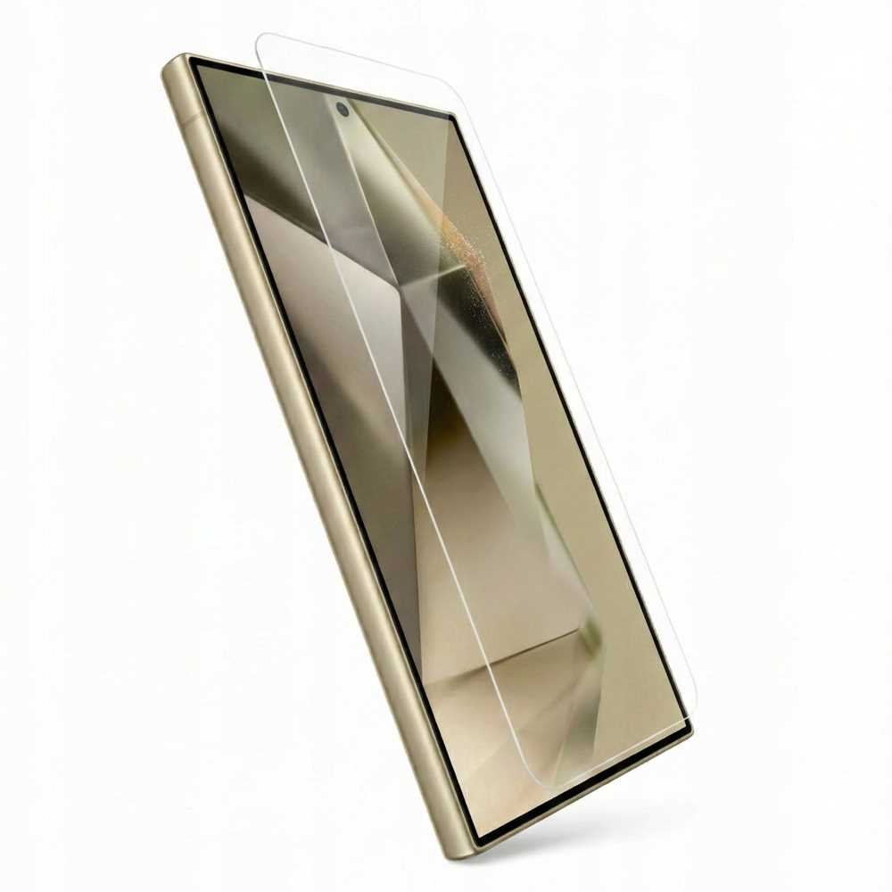 Złoty smartfon z osłoną ekranu leżącą na wyświetlaczu.