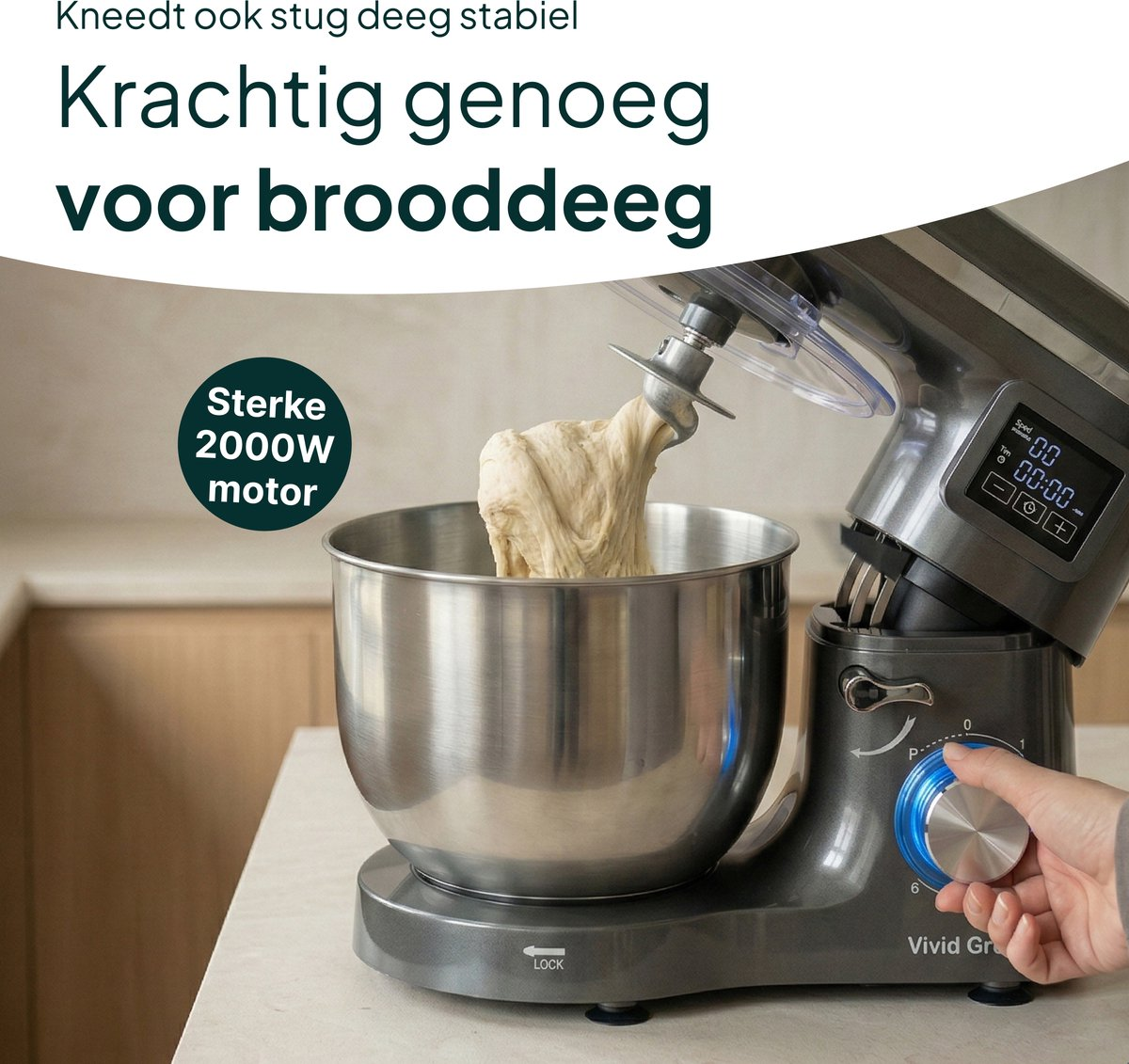 Grey stand mixer with dough in stainless steel bowl. Strong 2000W motor.