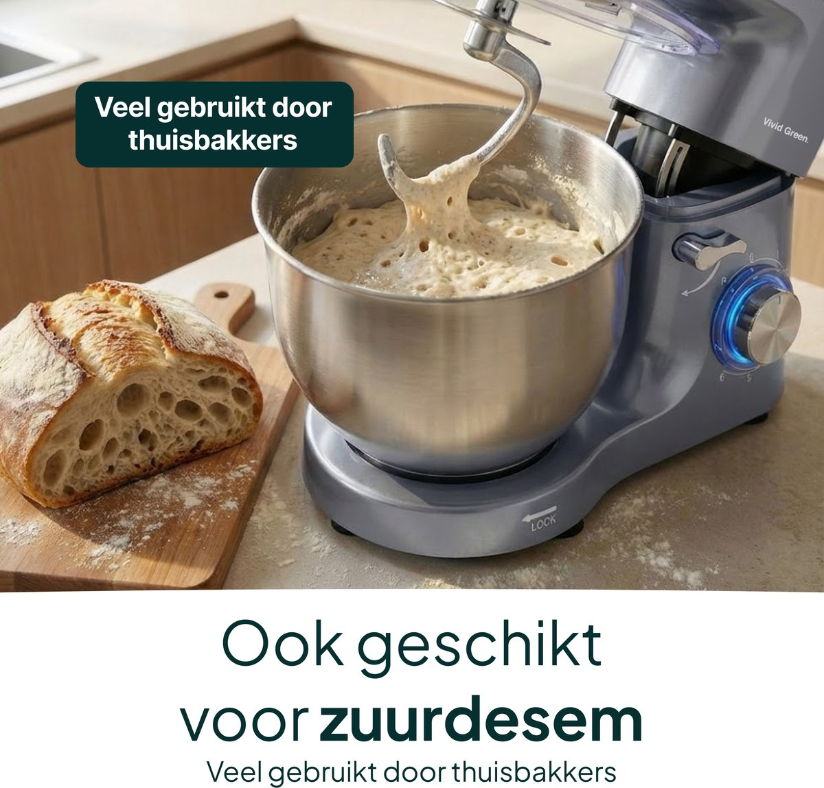 A kitchen mixer with dough and bread beside it.