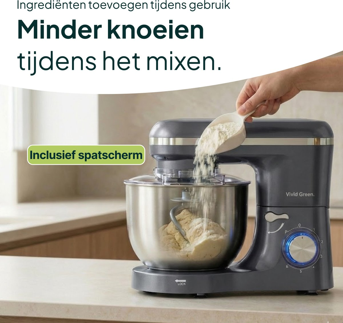 A grey stand mixer adds flour to dough, with a splash guard included.