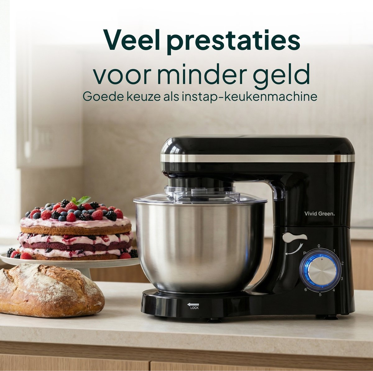 Black stand mixer with bowl, cake, and bread on a countertop.