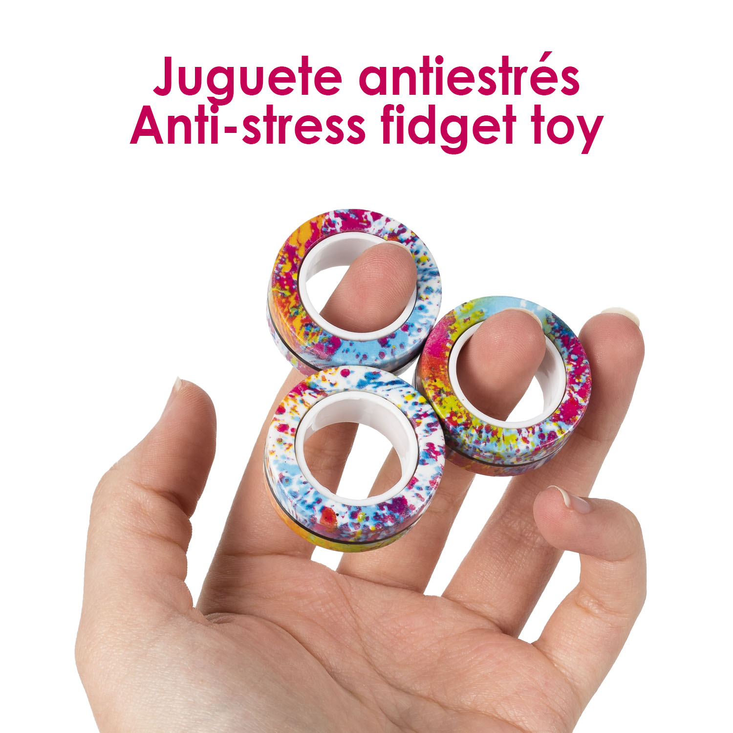 Anelli colorati antistress tenuti su una mano dalle dita.