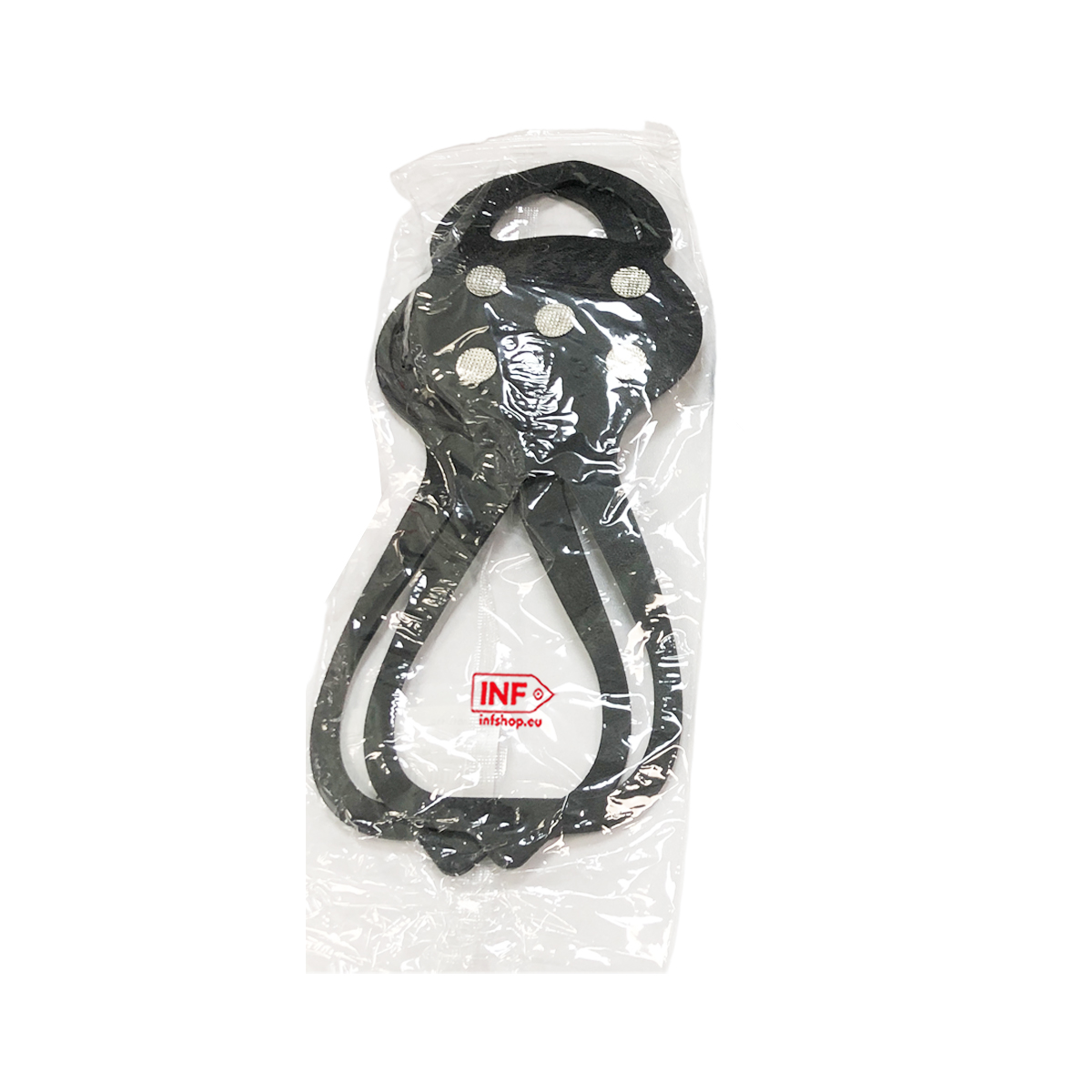 Schwarze Schuhspikes mit Metallstiften in transparenter Verpackung.