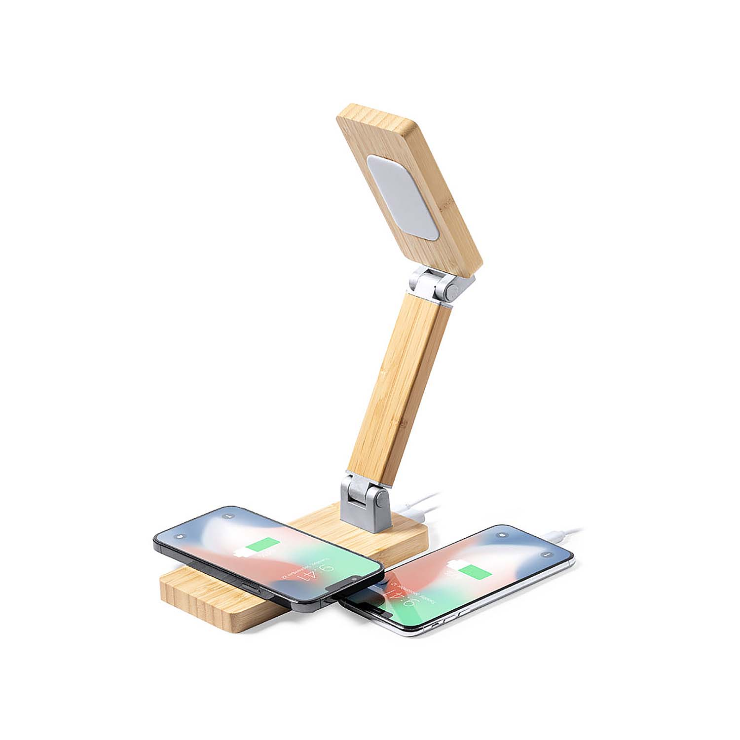 Lampada da scrivania in legno con due telefoni in carica su pad.