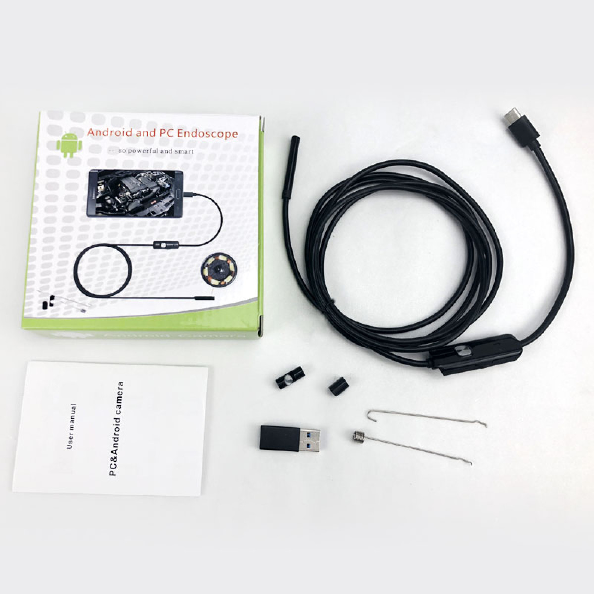 Endoskop Android i PC z kablem, adapterem USB, narzędziami i instrukcją obsługi.