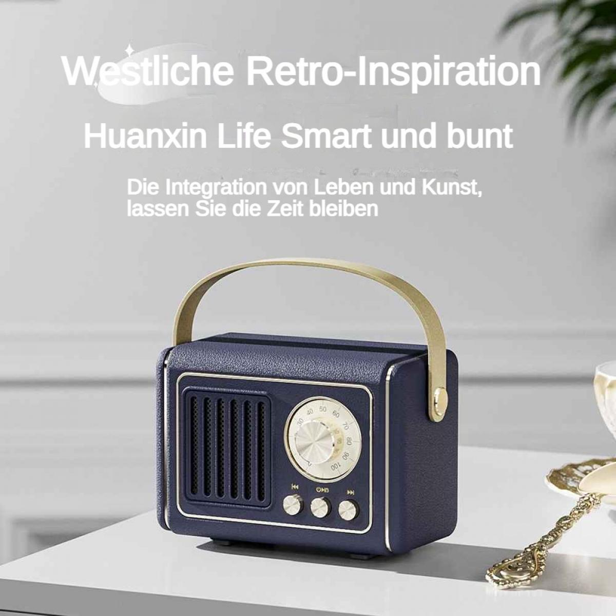 Ein dunkelblauer Retro-Radio mit goldenem Griff und Zifferblatt.