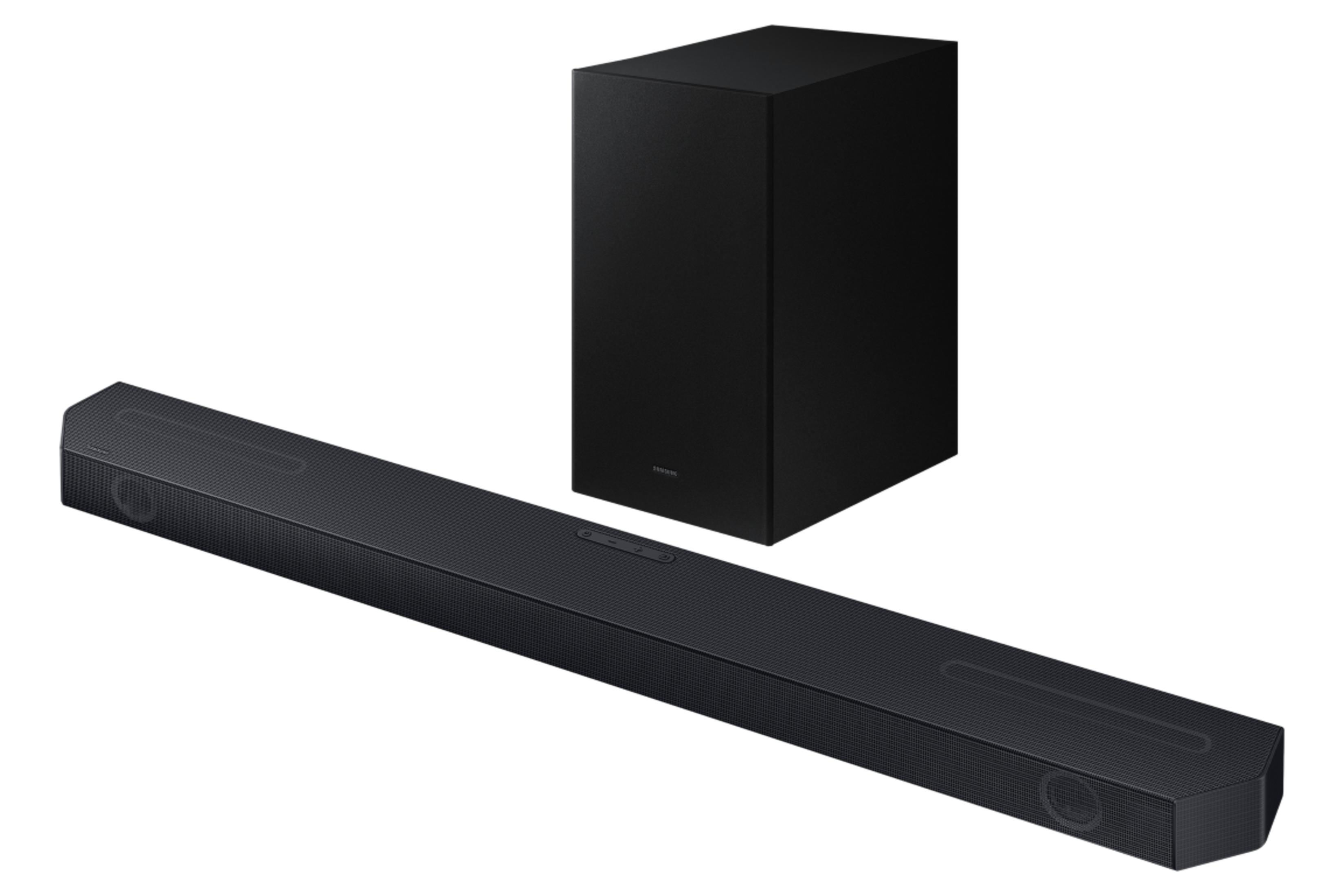 Siyah ses çubuğu ve subwoofer yan yana beyaz arka planda.