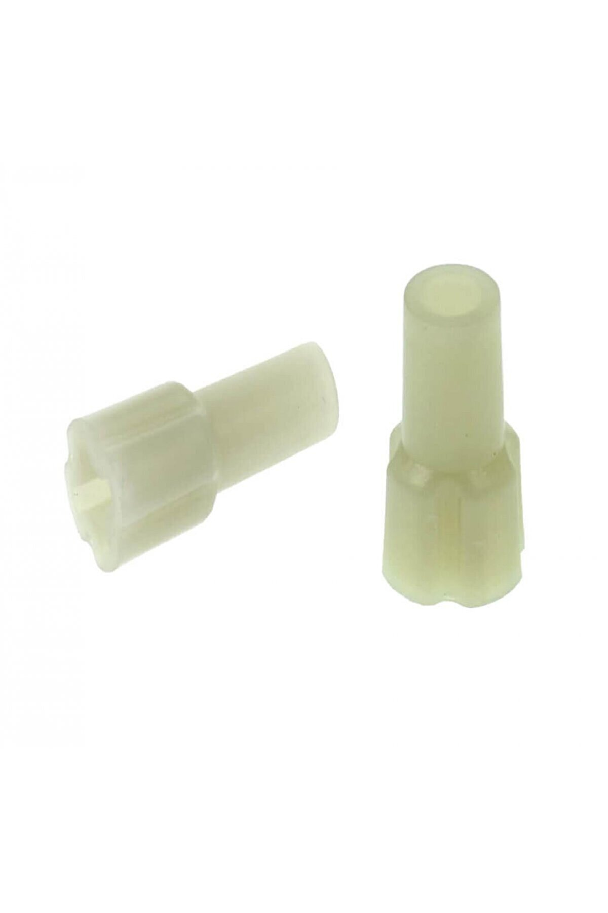 Beyaz arka plan üzerinde nervürlü uçlara sahip iki beyaz plastik konnektör.