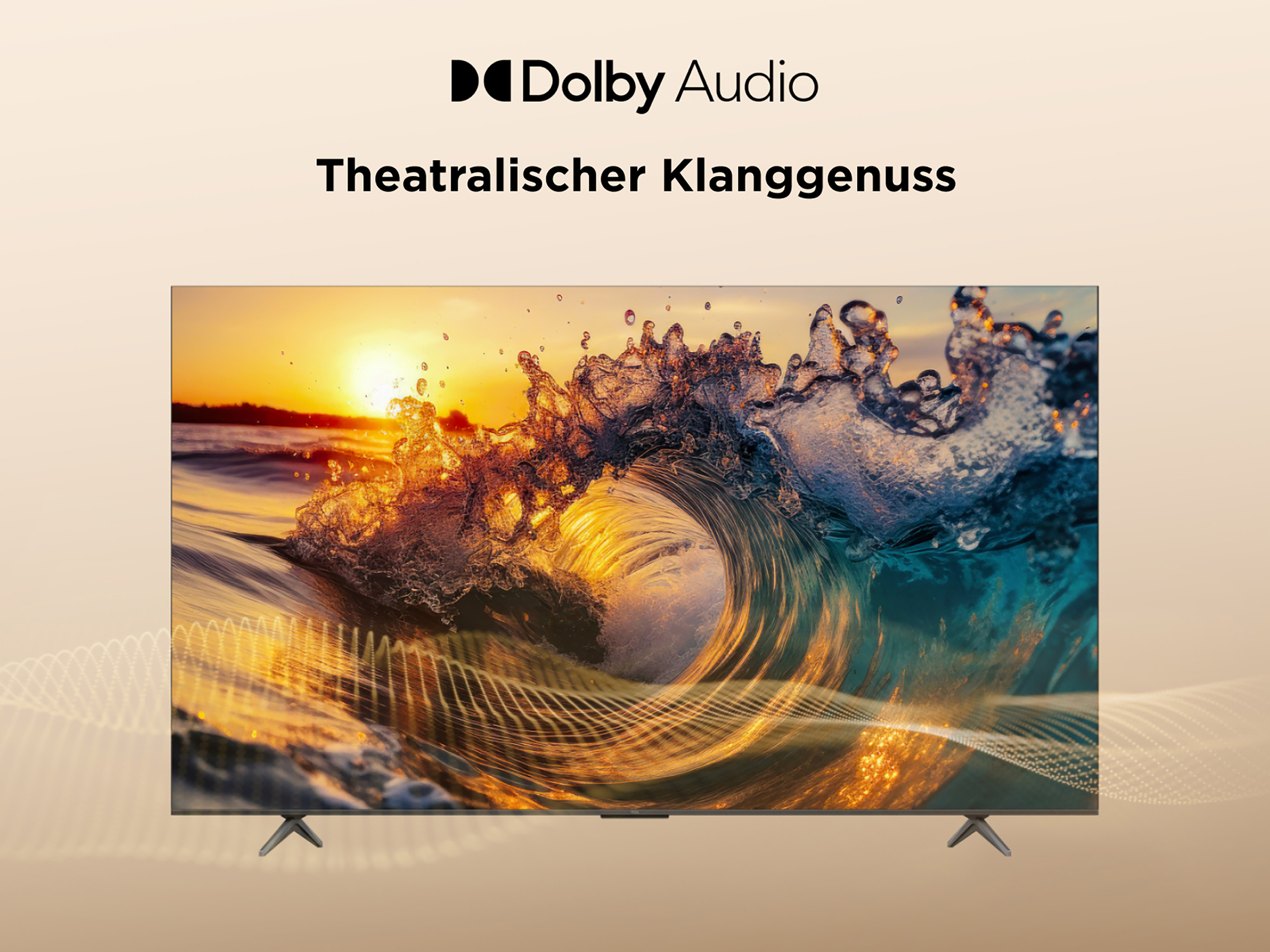 Ein Fernseher zeigt eine stürmische Welle bei Sonnenuntergang, mit Dolby Audio Logo.