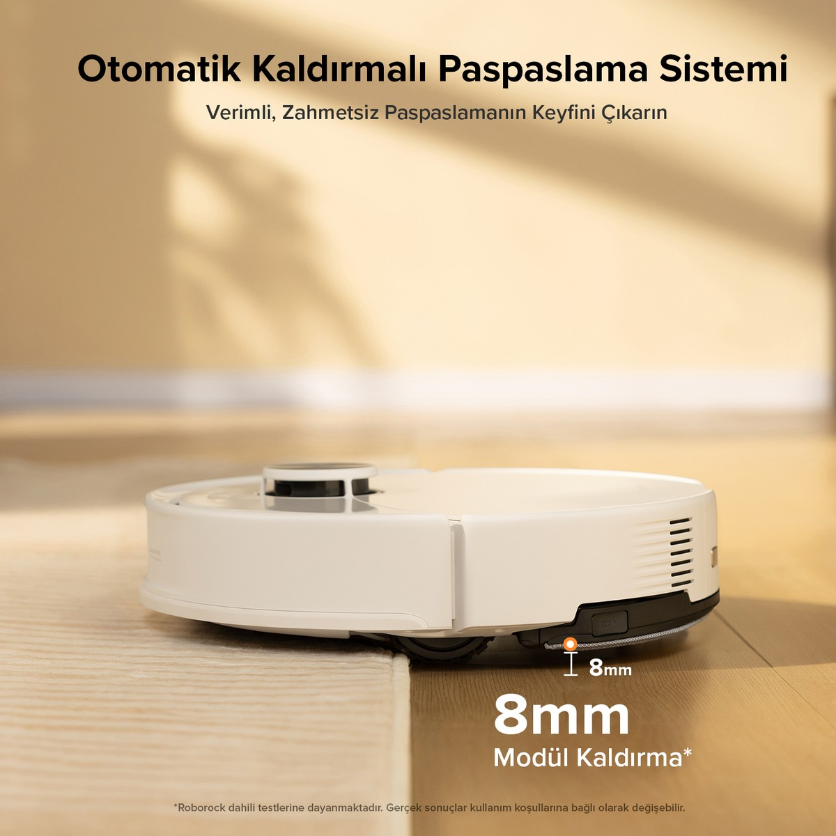 Beyaz robot süpürge halıya girerken 8 mm yükseliyor.