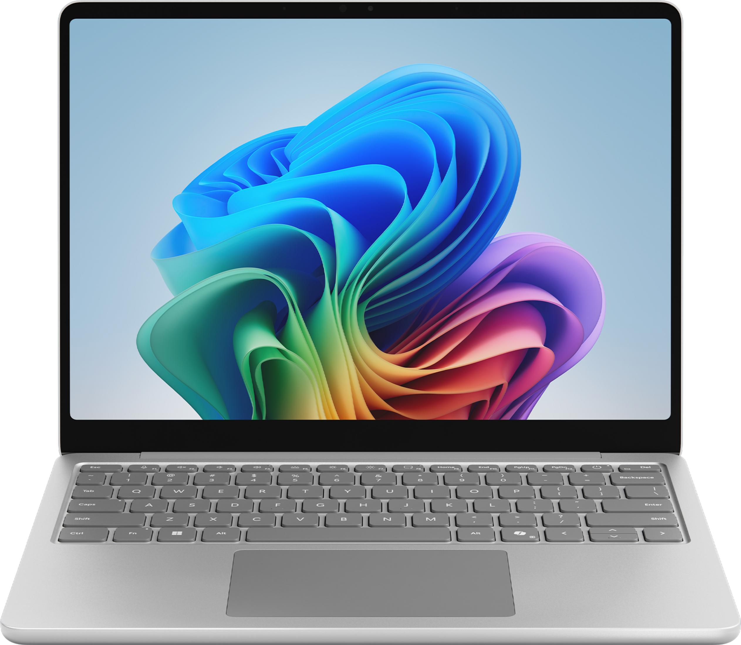 Ein silberner Laptop mit einem bunten, abstrakten Hintergrundbild.