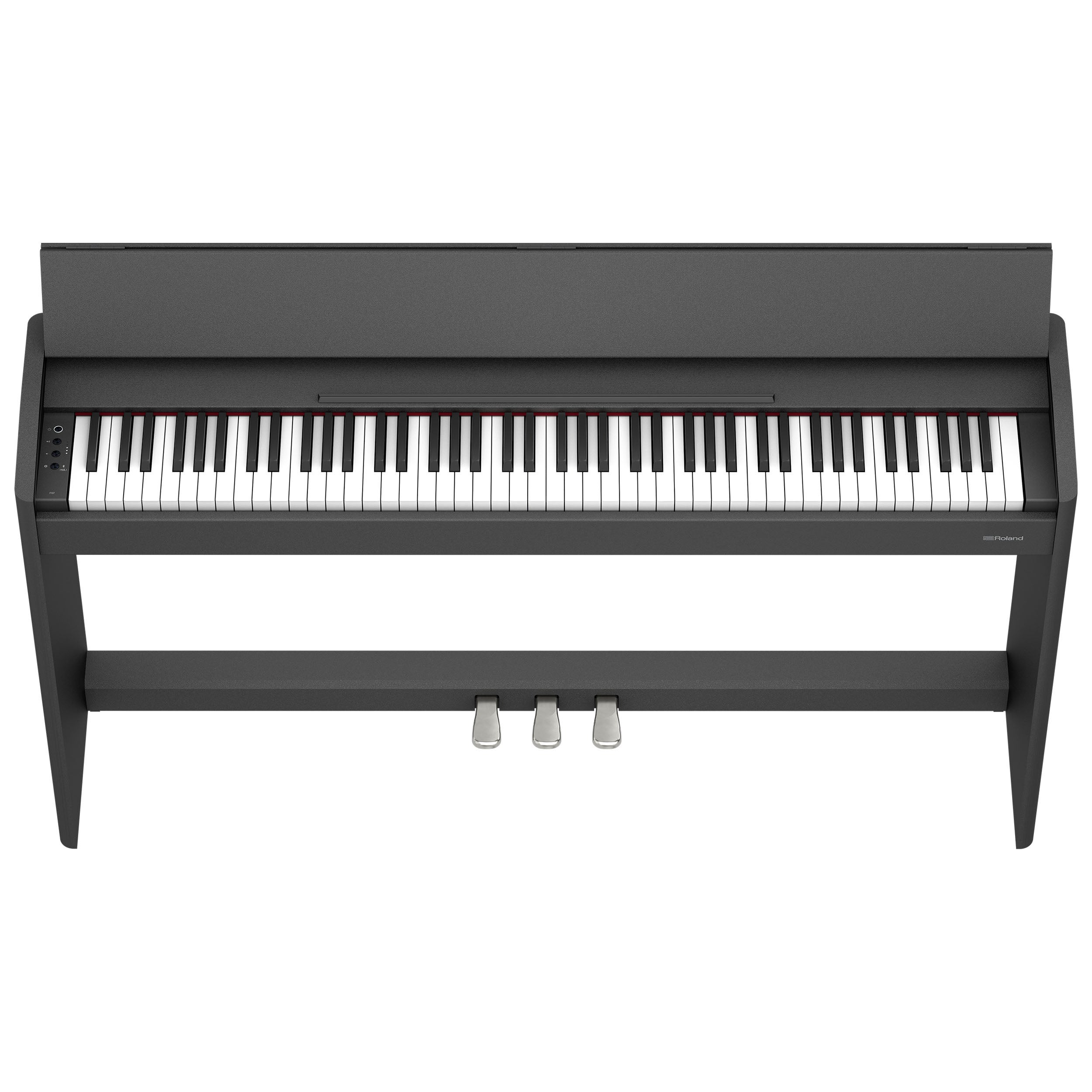 A dark digital piano with black and white keys and three pedals.