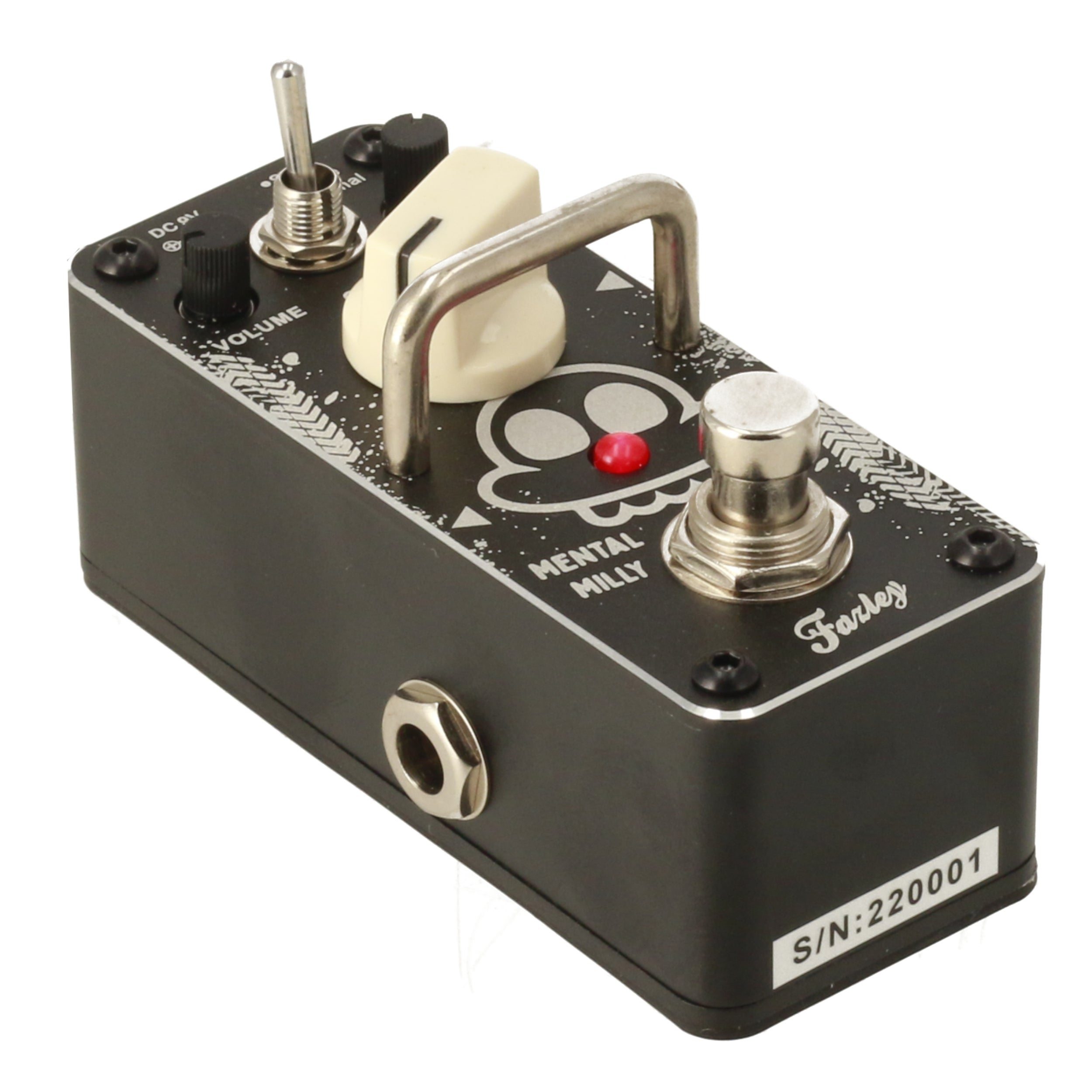 A black guitar pedal with a skull graphic, silver switch, and red LED. Serial number: 220001.