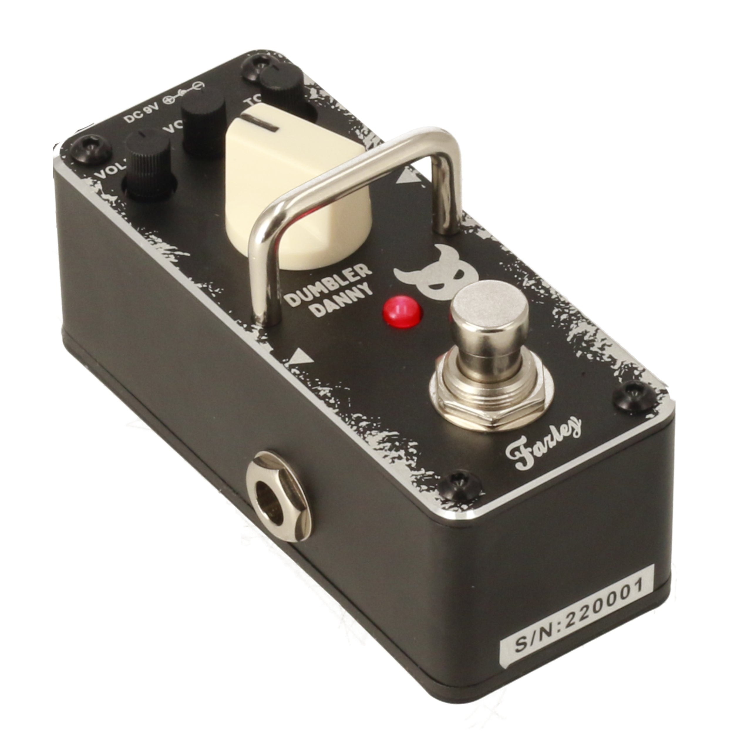 Black guitar effects pedal with silver knob, red LED, and metal handle.