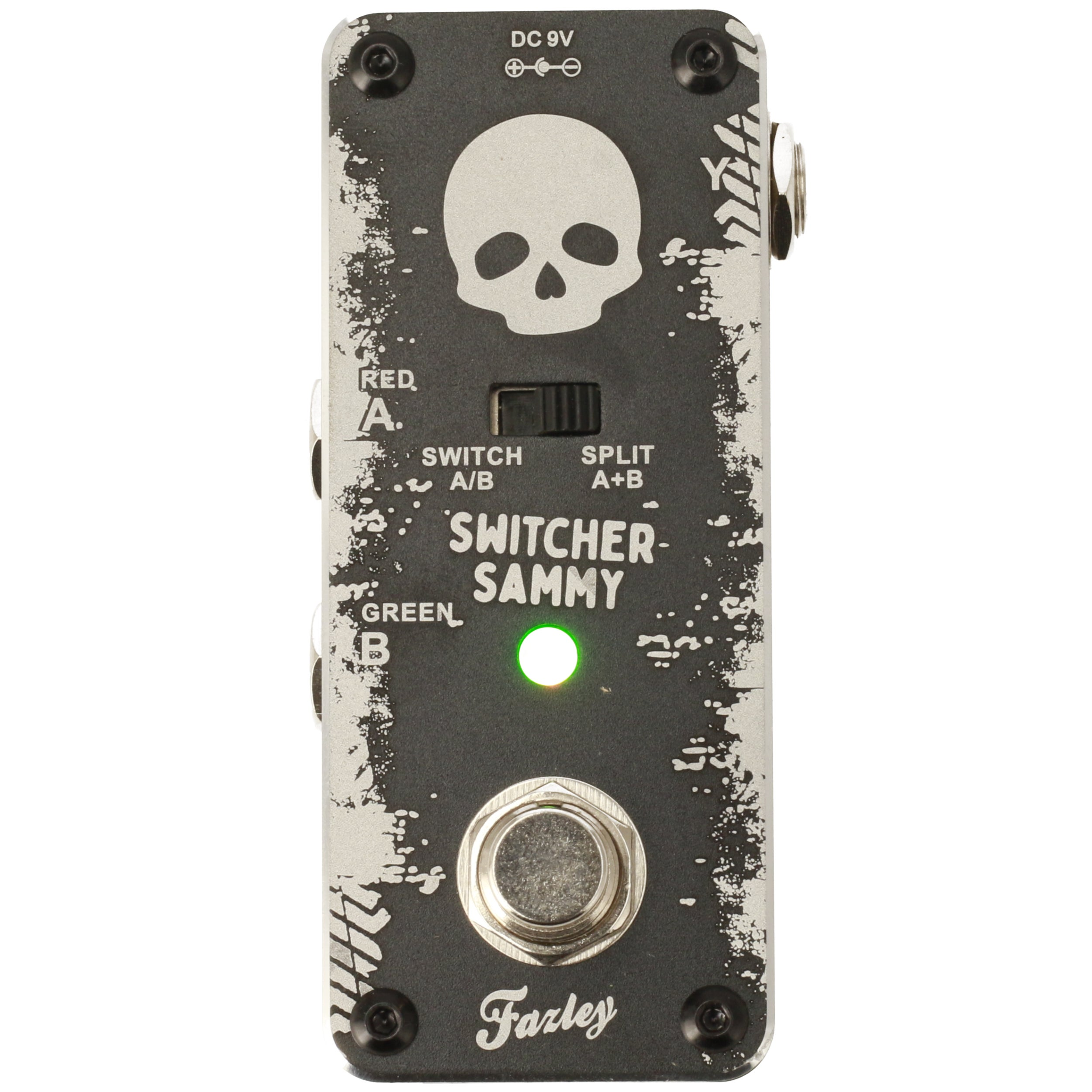 A black pedal with skull design, green light, and labels. Features include DC 9V input.