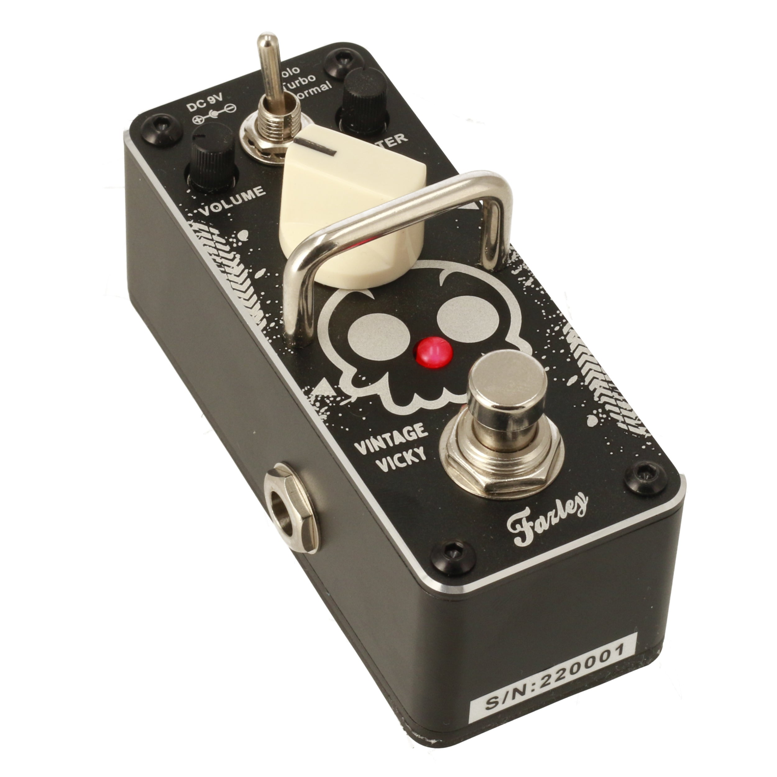 Black effect pedal with skull design, silver knobs, and a red LED light.
