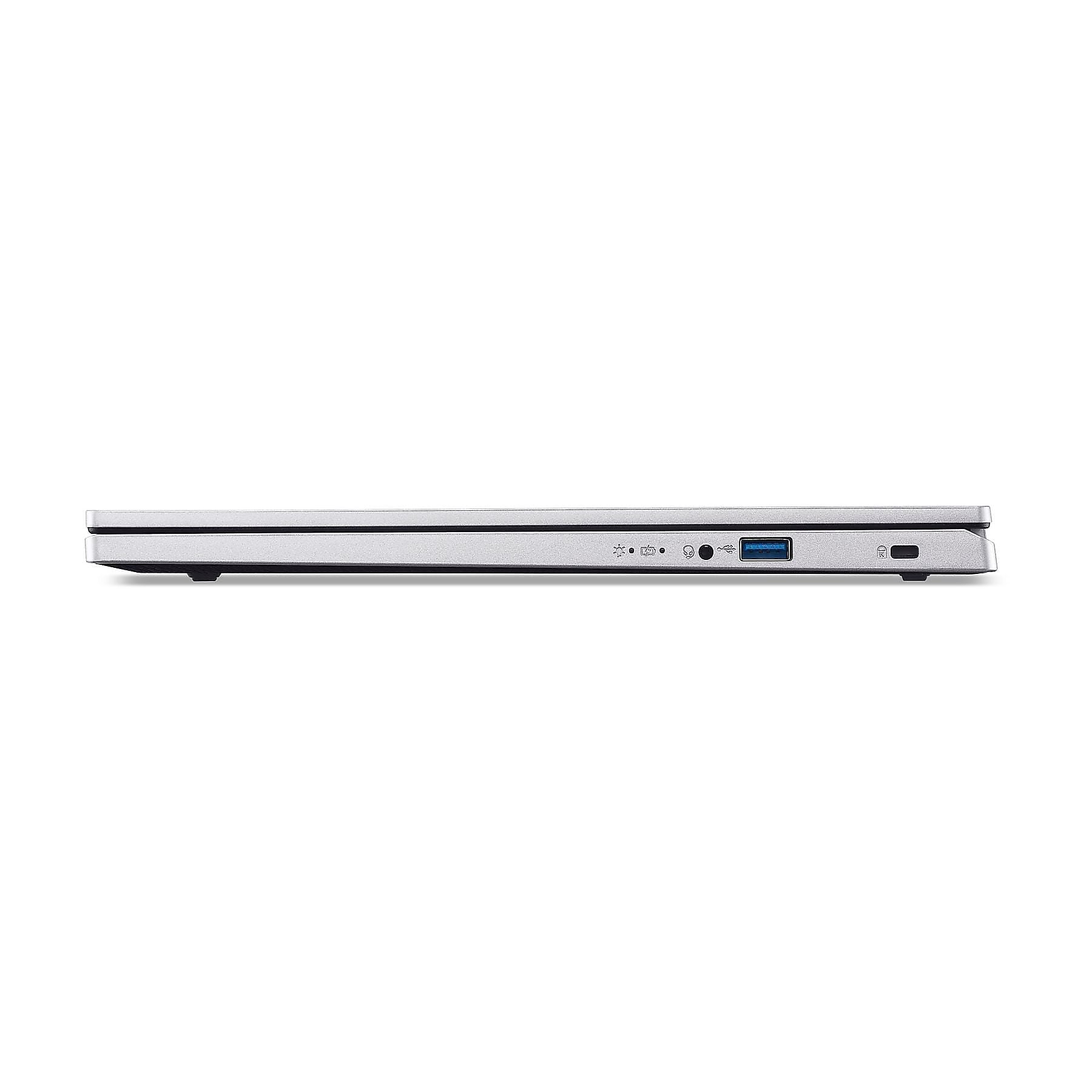 Vista laterale laptop argento: USB-A, jack cuffie, pulsante accensione, slot SD card.