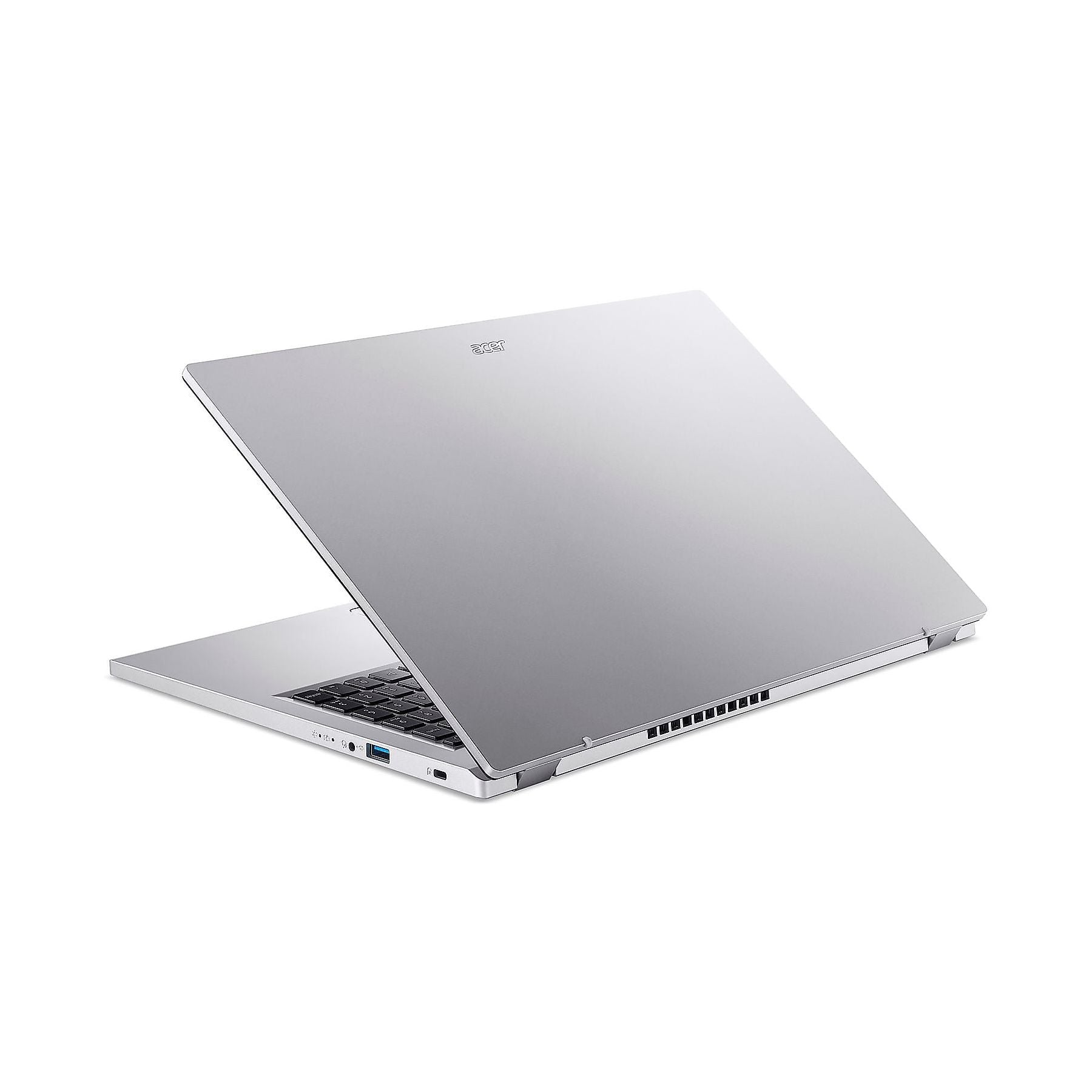 Un laptop argentato con schermo aperto, che rivela la tastiera, su sfondo bianco.