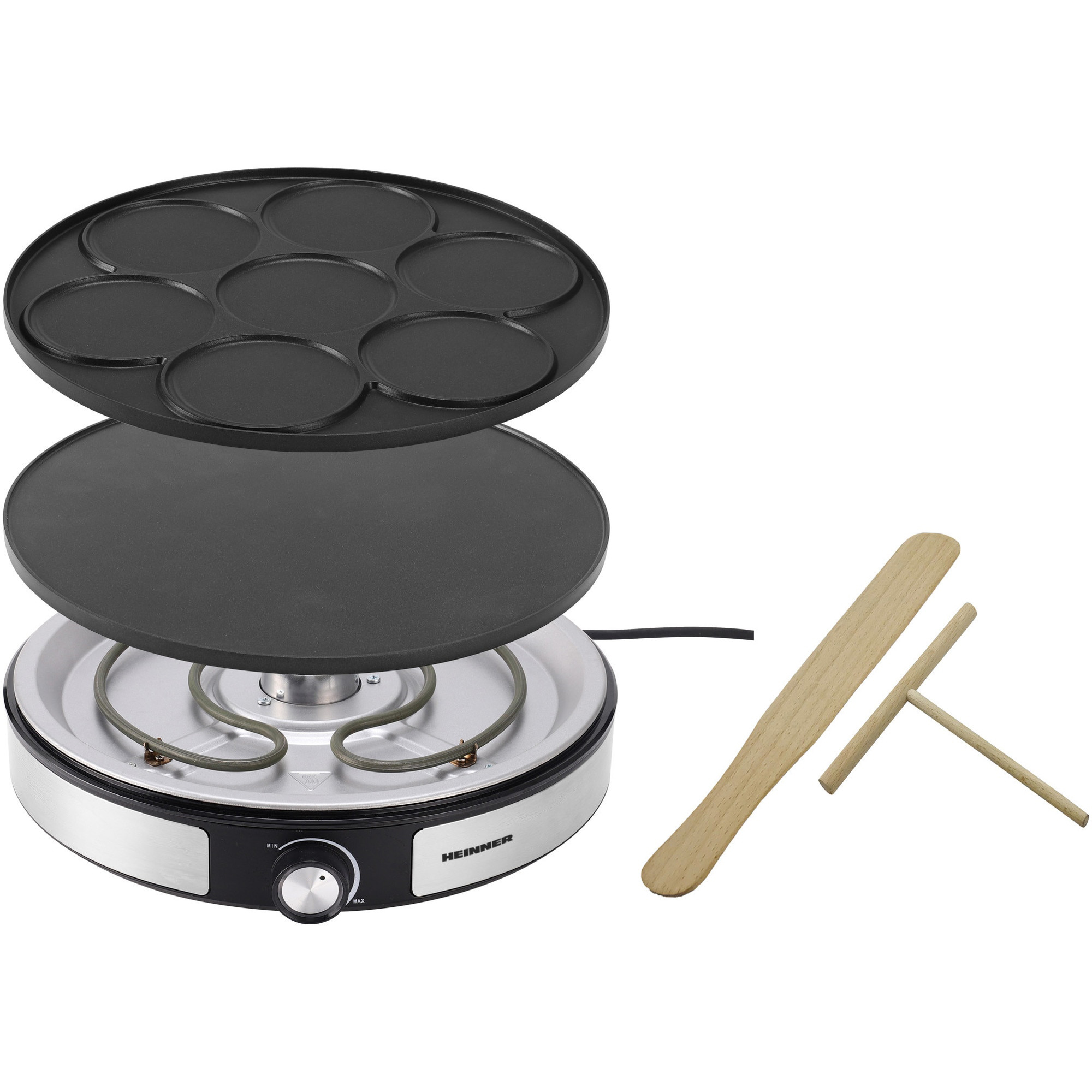 An electric pancake maker with multiple molds and wooden tools.